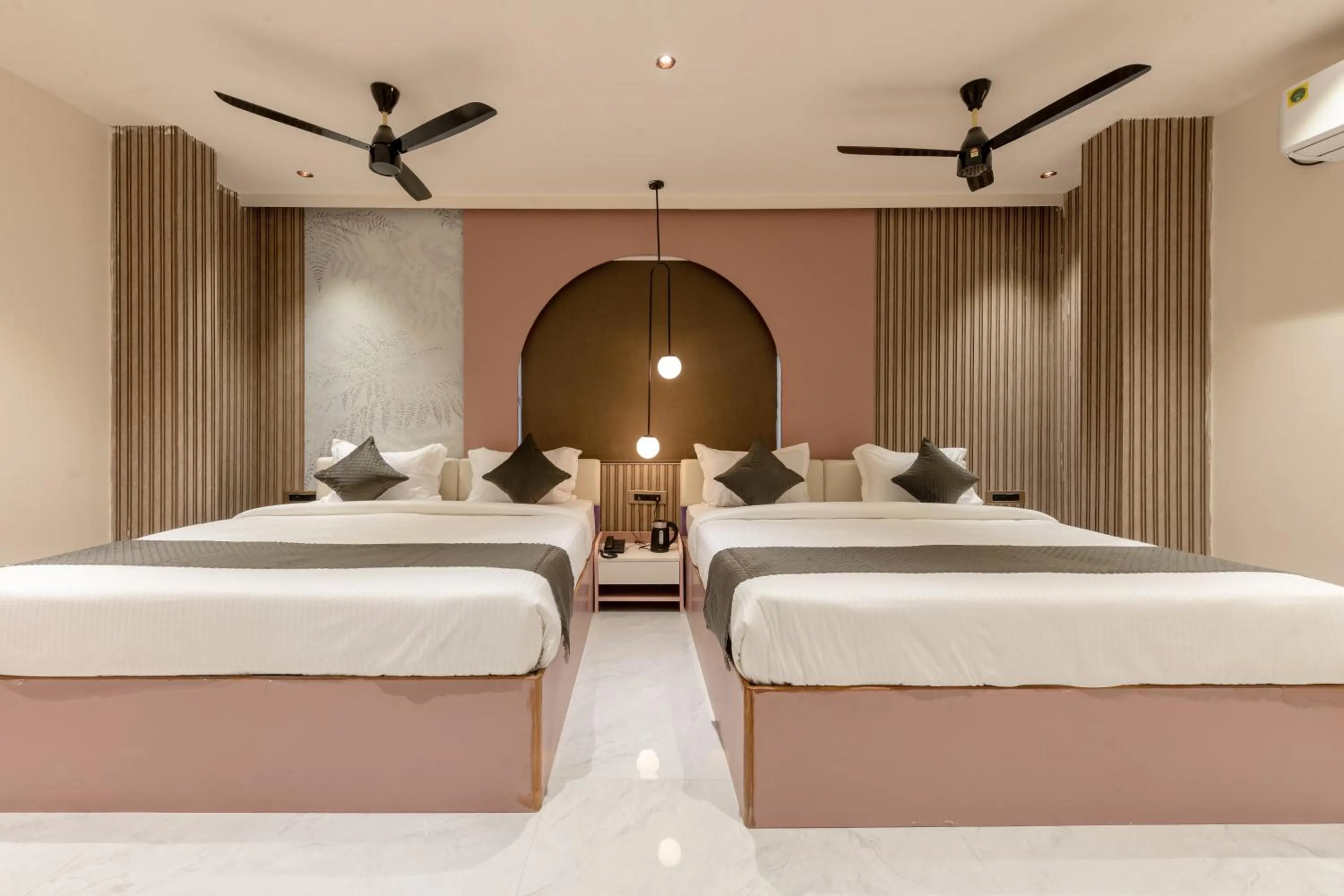 Bed in Legacy Inn, Mysore