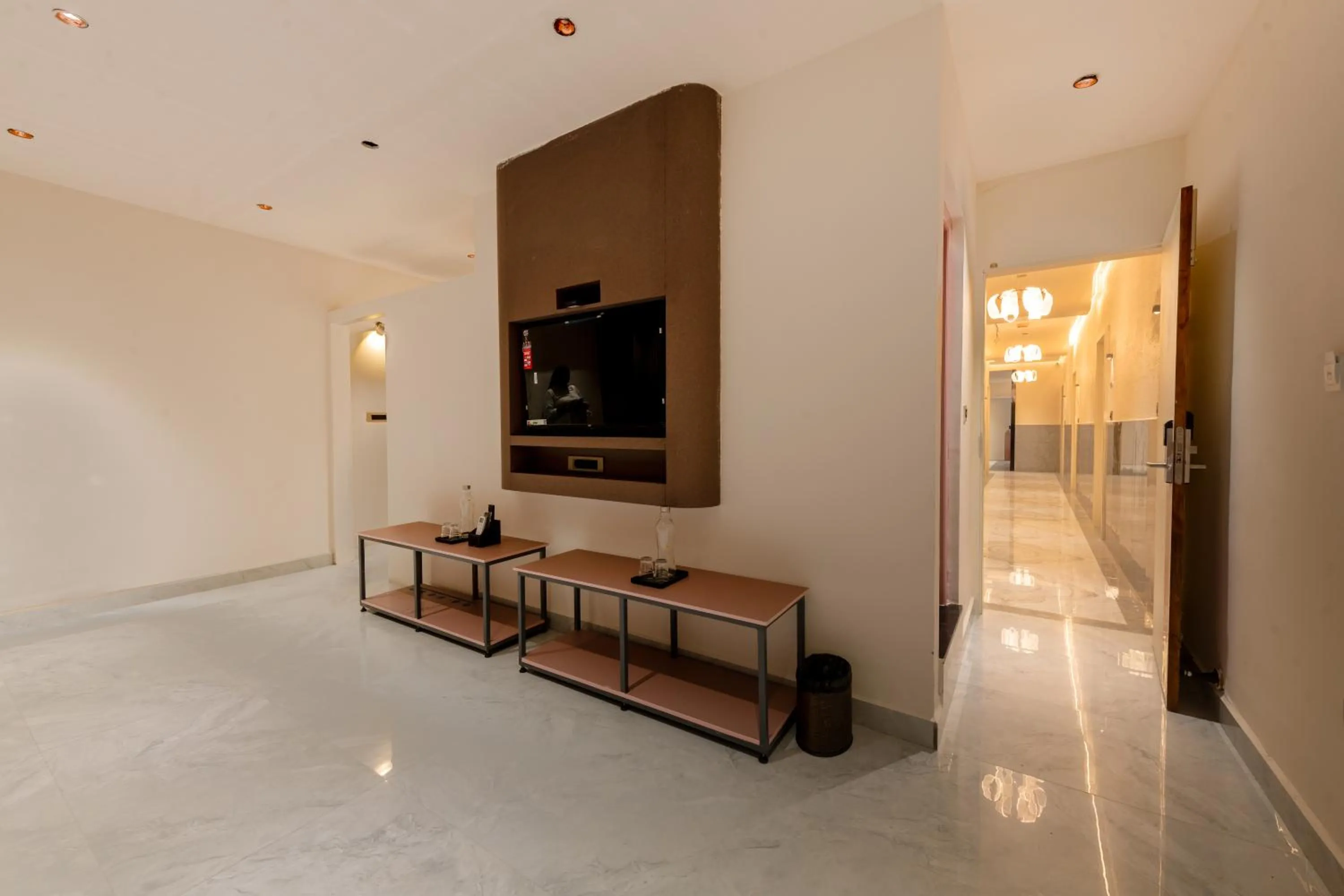 Communal lounge/ TV room in Legacy Inn, Mysore
