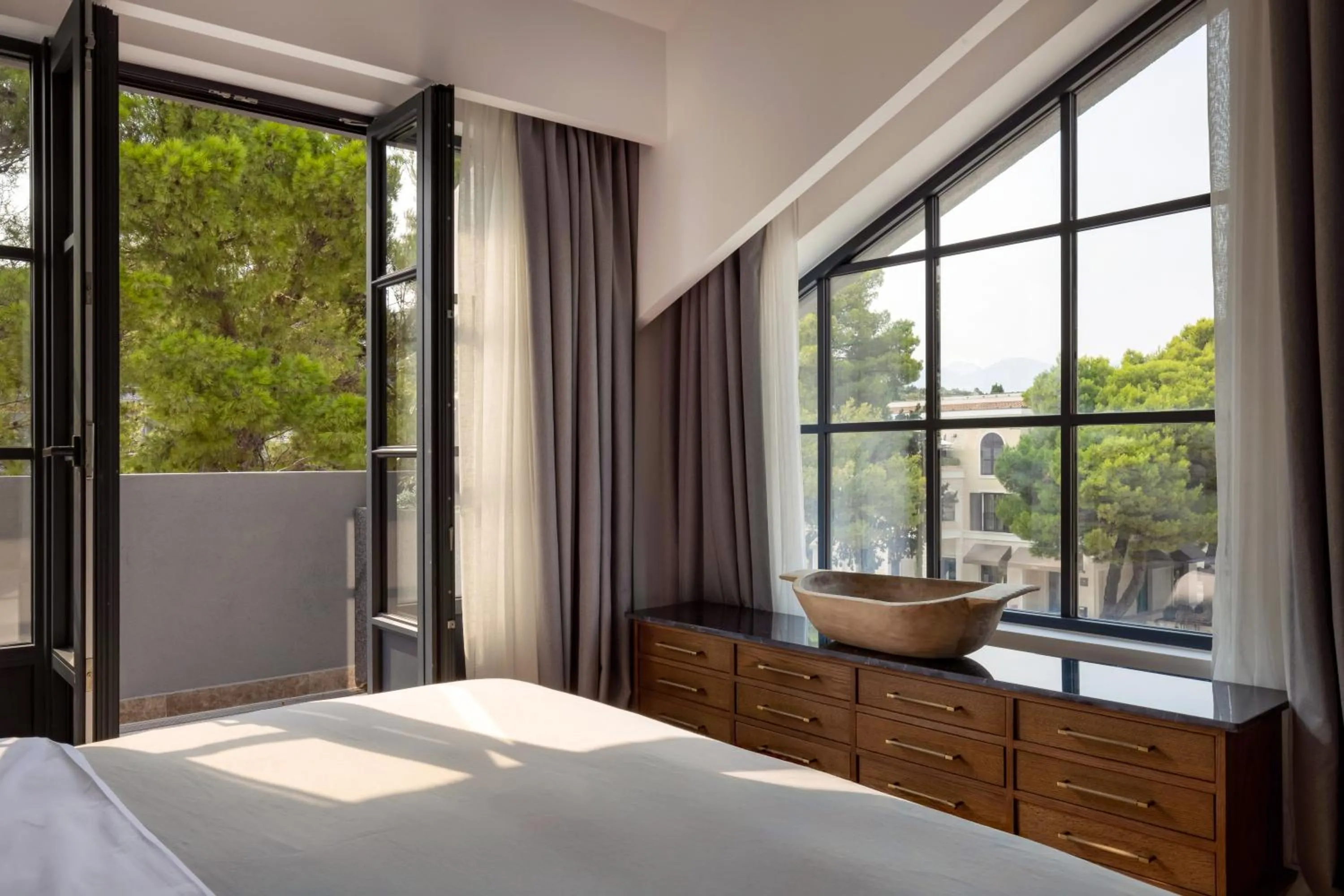 Balcony/Terrace, Bed in Centrale Lustica Bay by Angsana