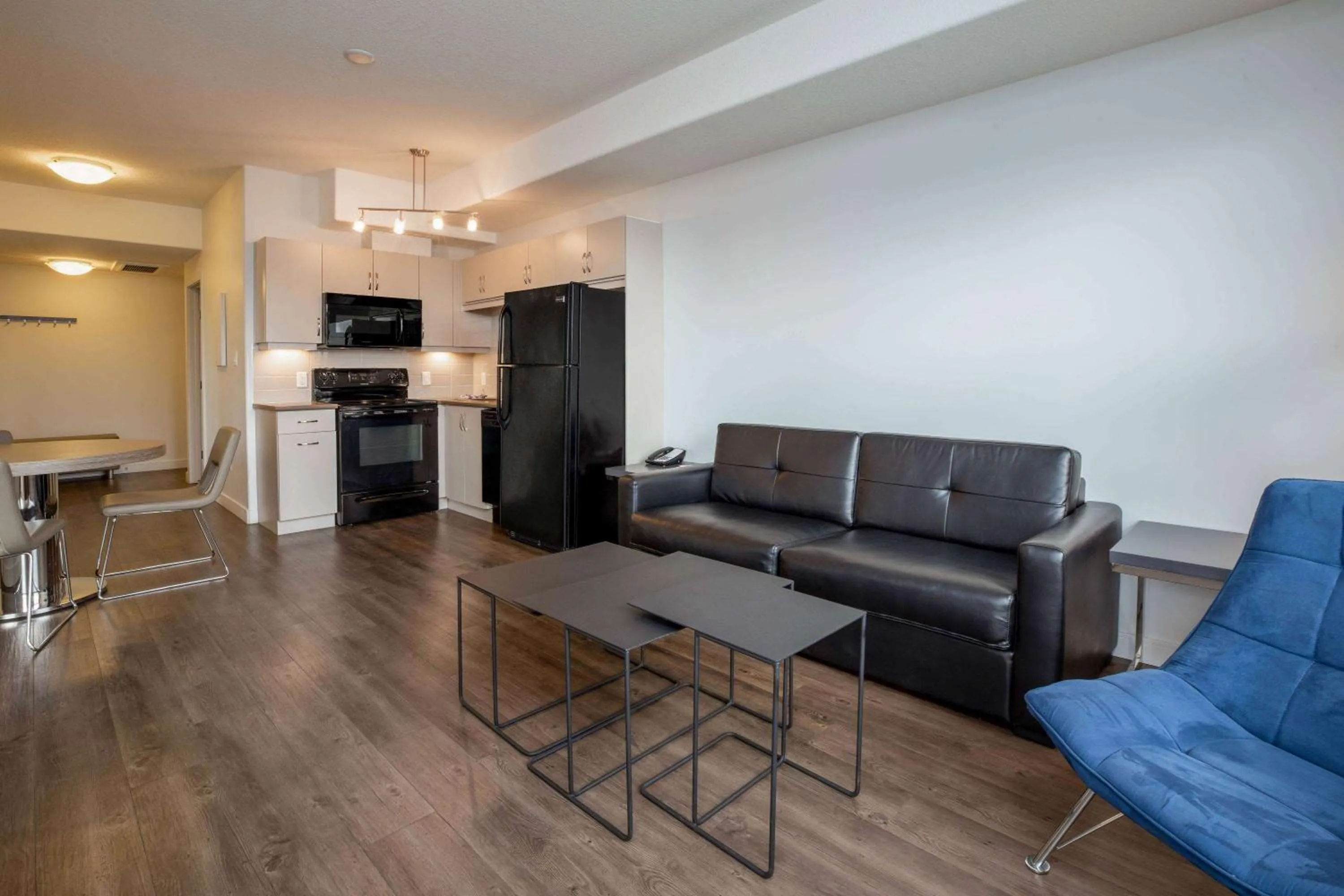 Photo of the whole room, Seating Area in Ramada by Wyndham Fort McMurray