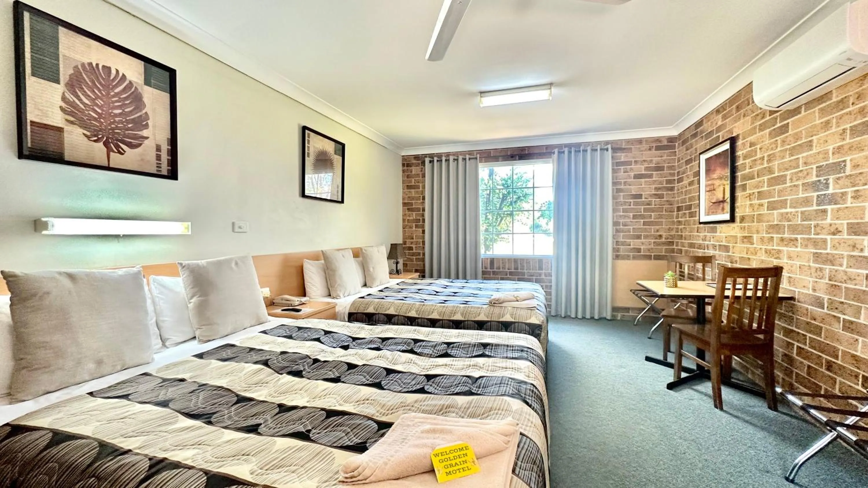 Photo of the whole room, Bed in Golden Grain Motor Inn