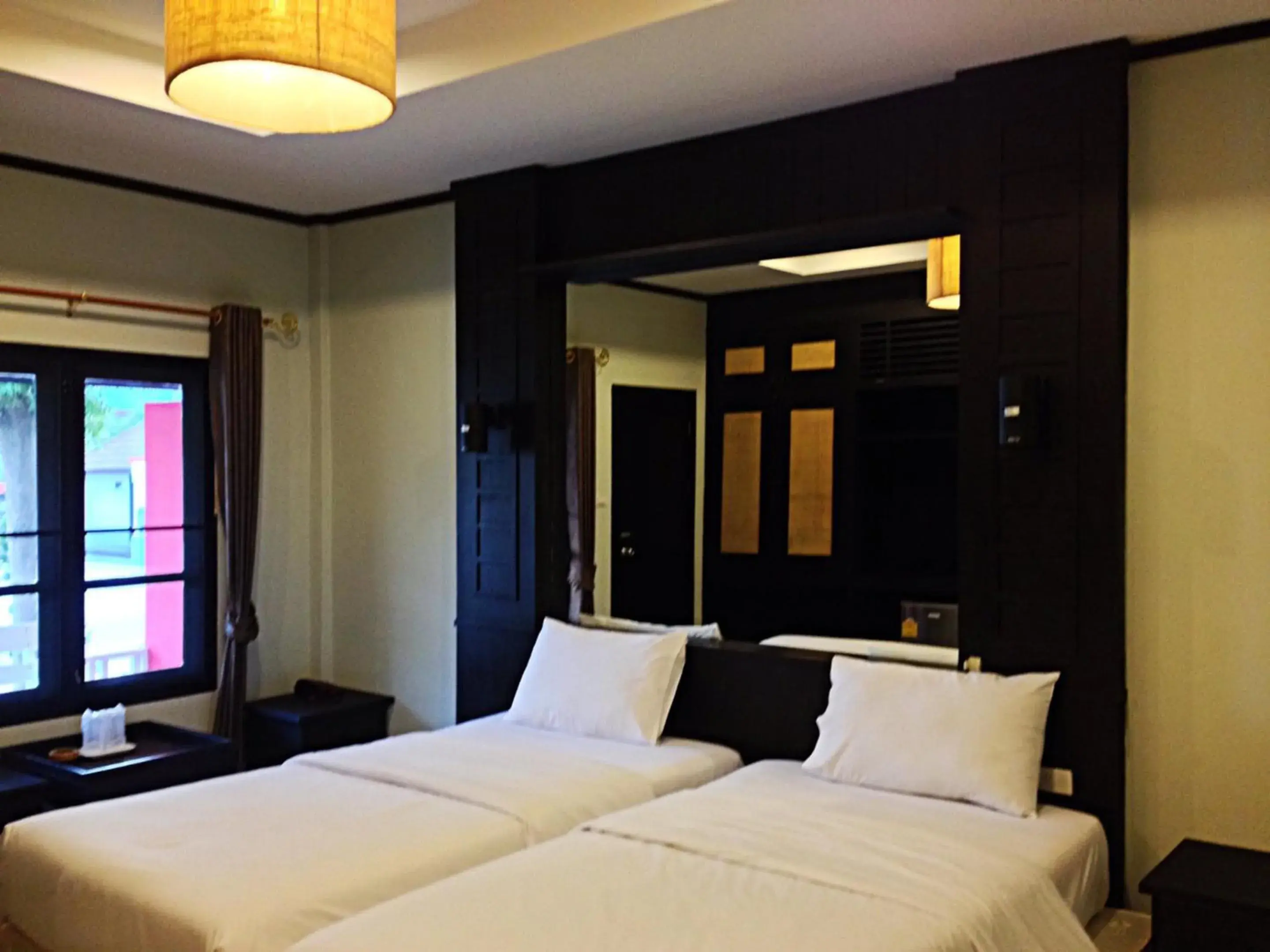 Photo of the whole room, Bed in Nice Resort Pattaya