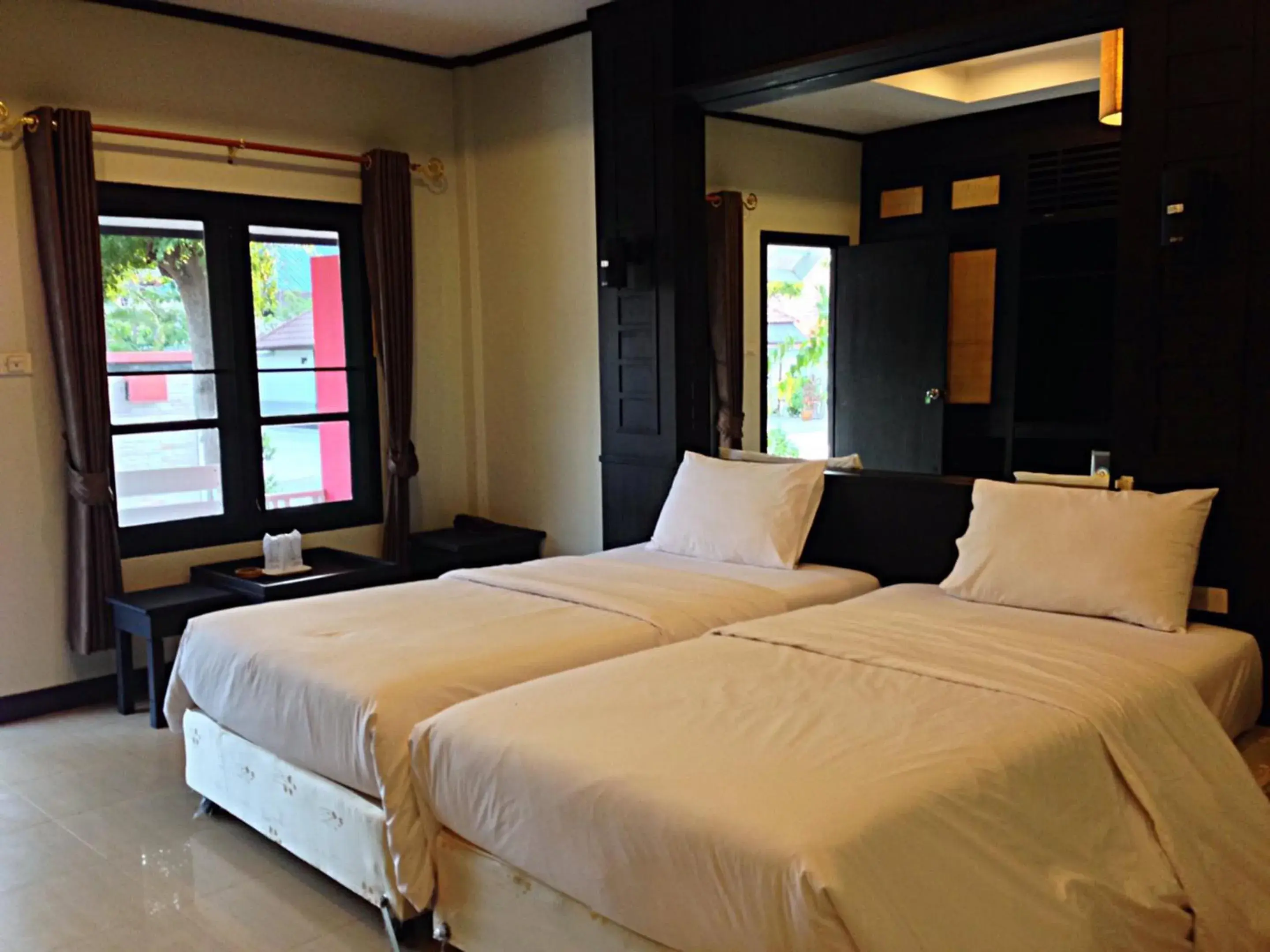 Photo of the whole room, Bed in Nice Resort Pattaya