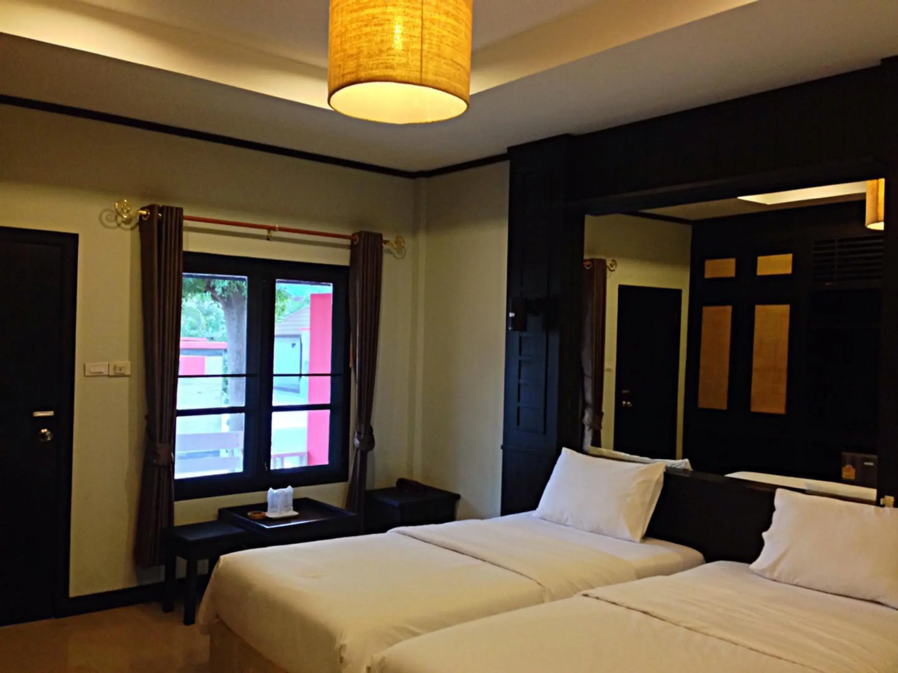 Photo of the whole room, Bed in Nice Resort Pattaya