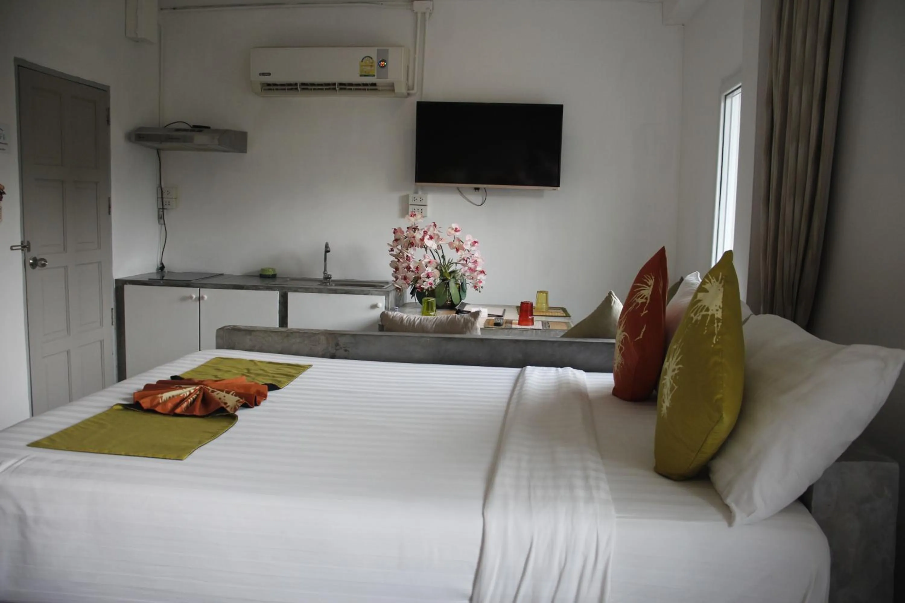 Bed in Samui Beach Residence Hotel