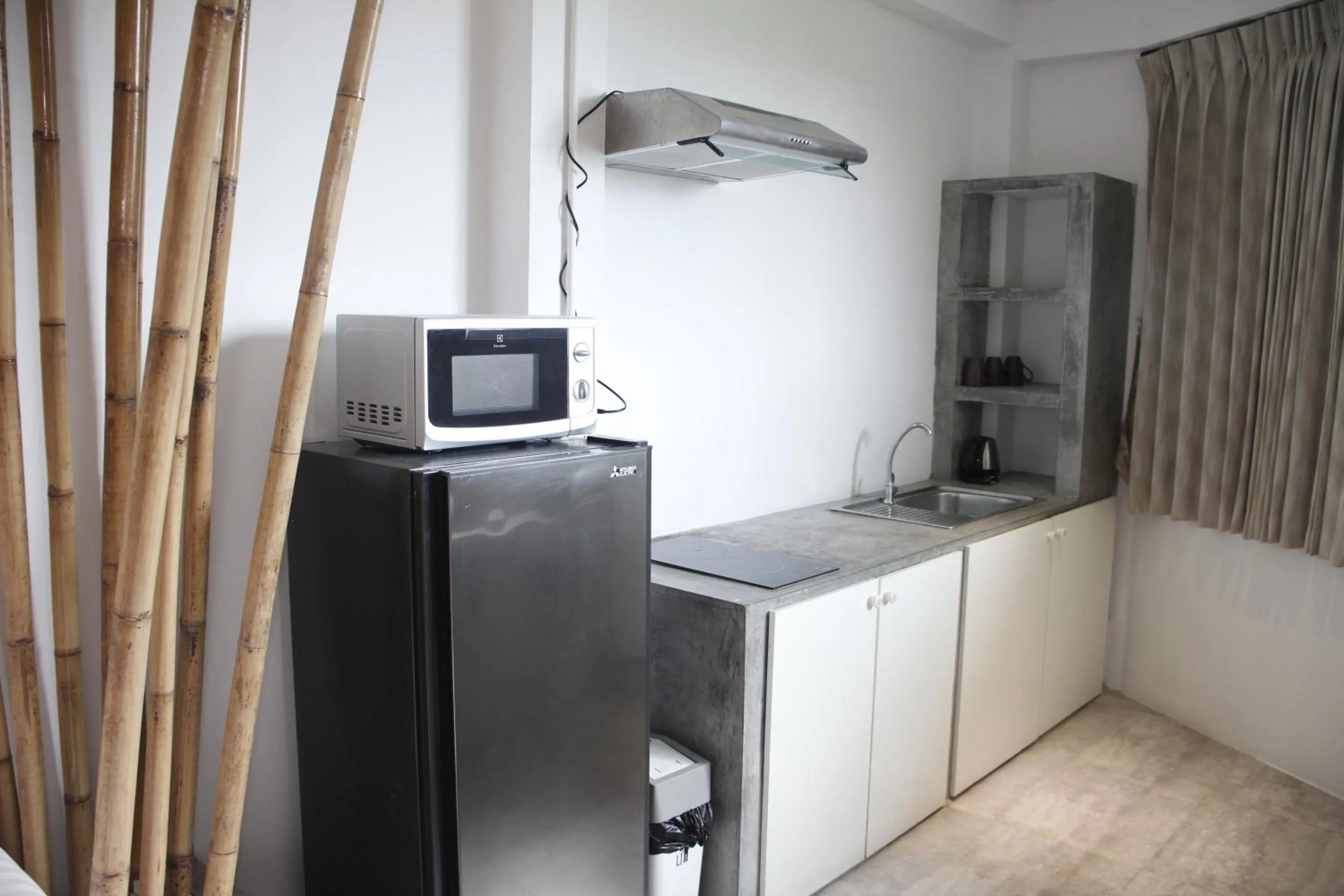 Kitchen or kitchenette in Samui Beach Residence Hotel