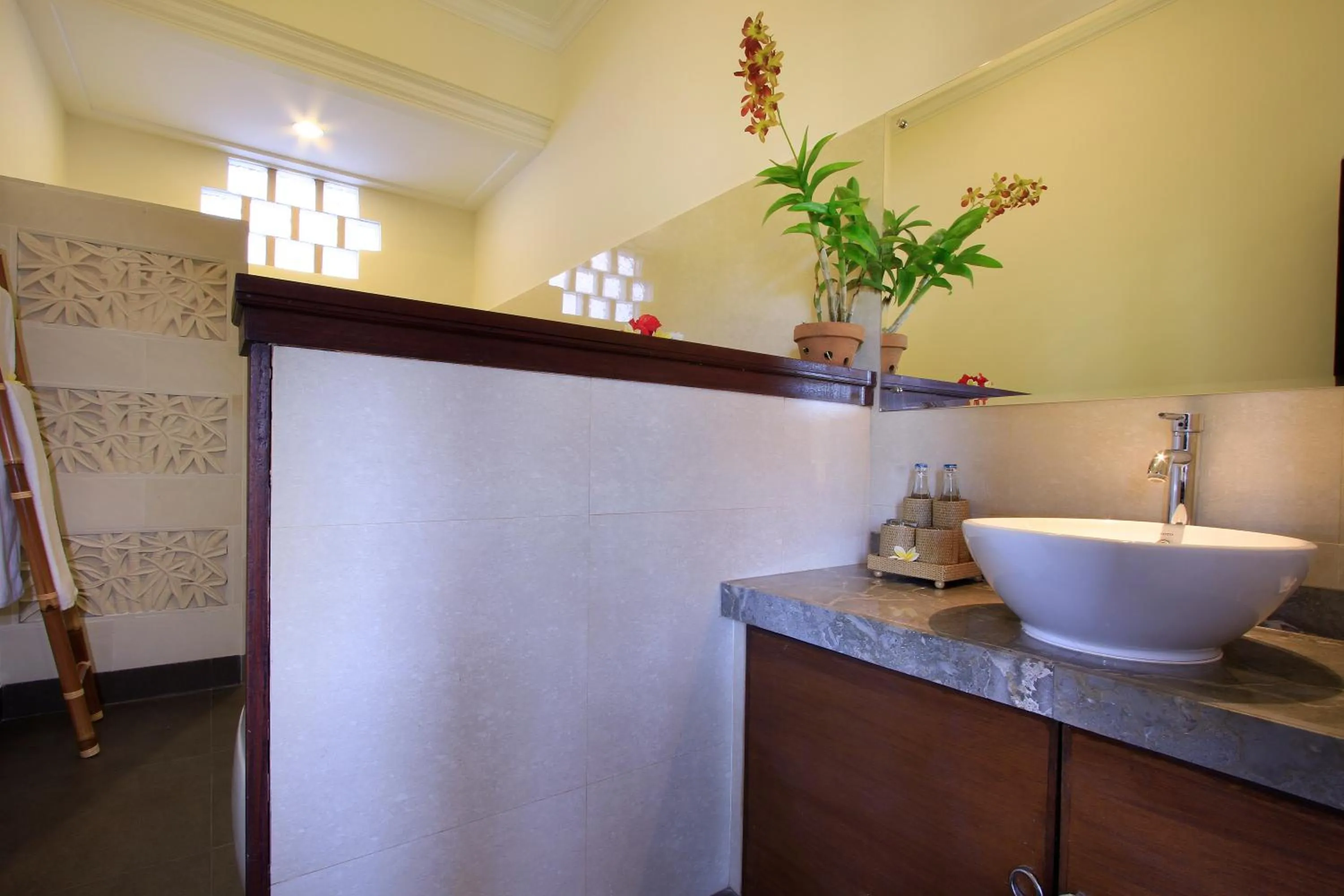 Bathroom in Nang Ade Villa by GenuineHost