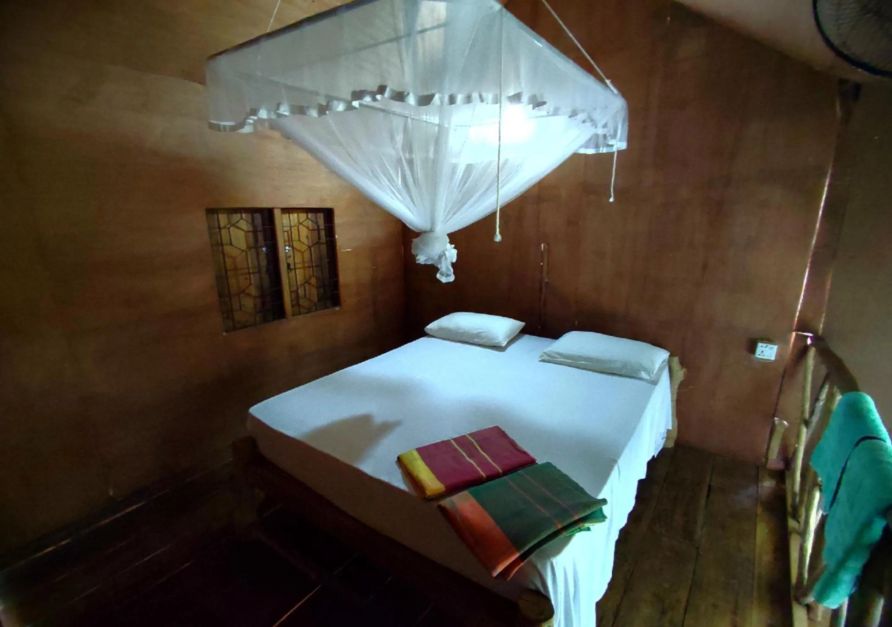 Photo of the whole room, Bed in Sigiriya River Side Villa