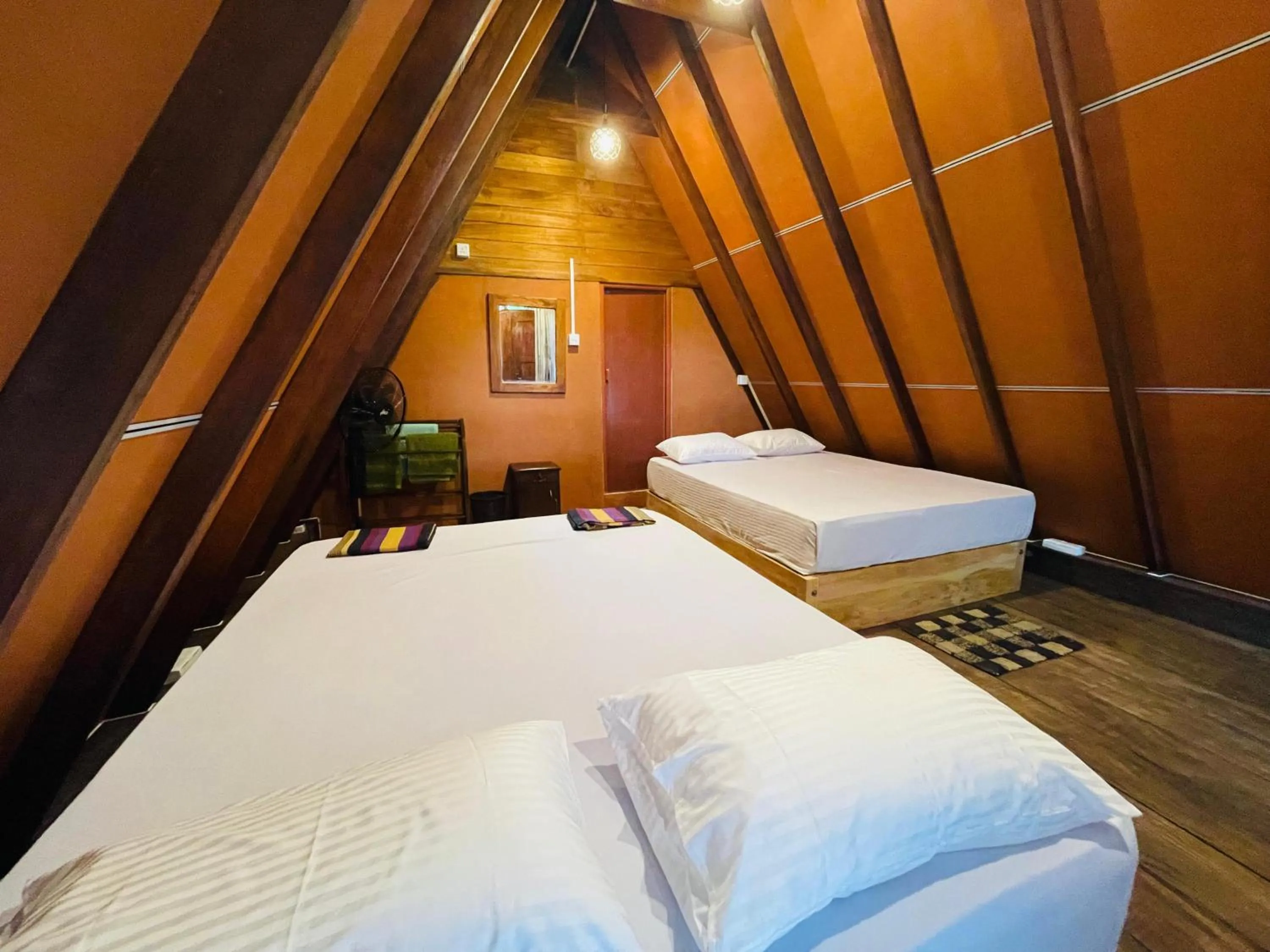 Bed in Sigiriya River Side Villa