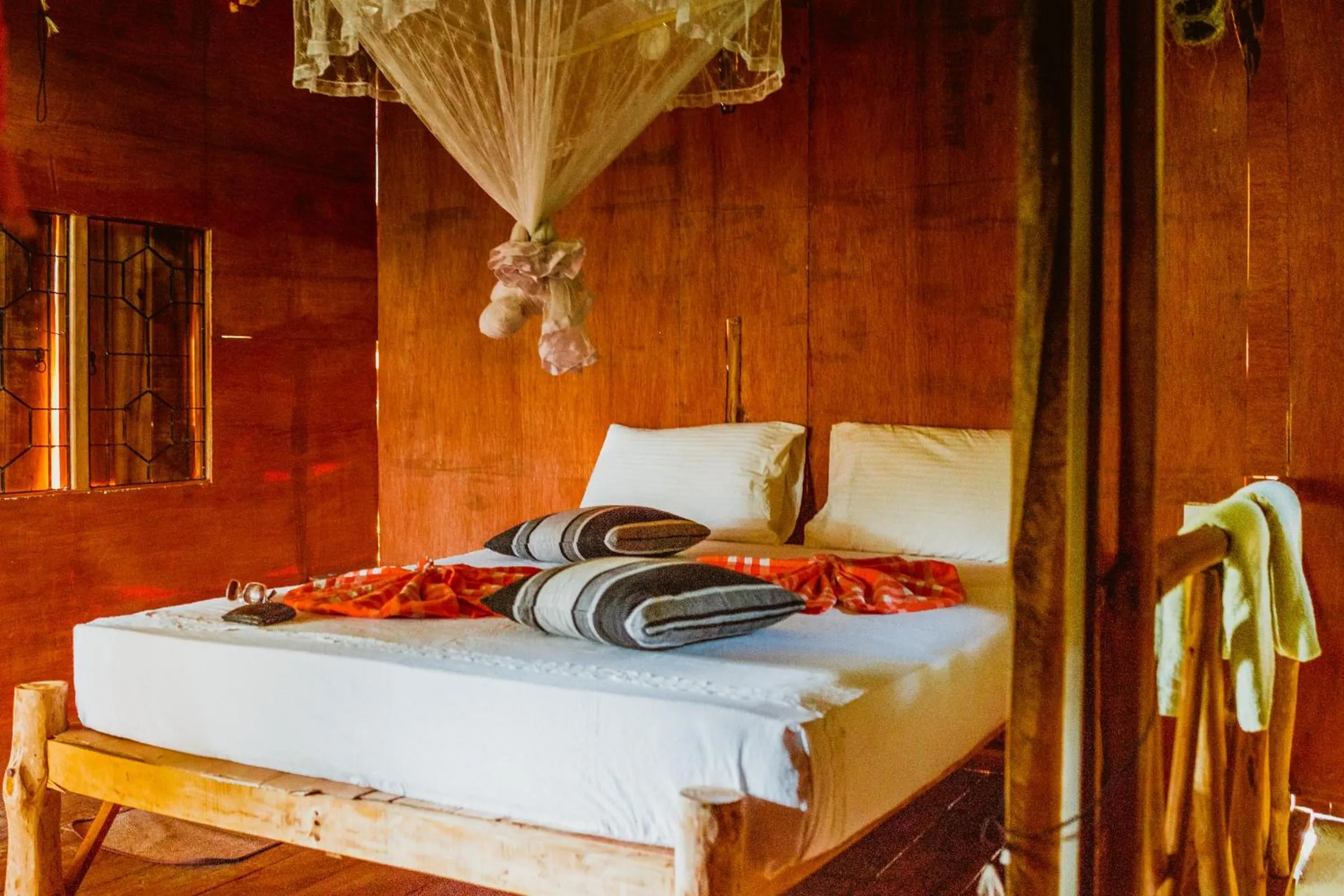 Bed in Sigiriya River Side Villa