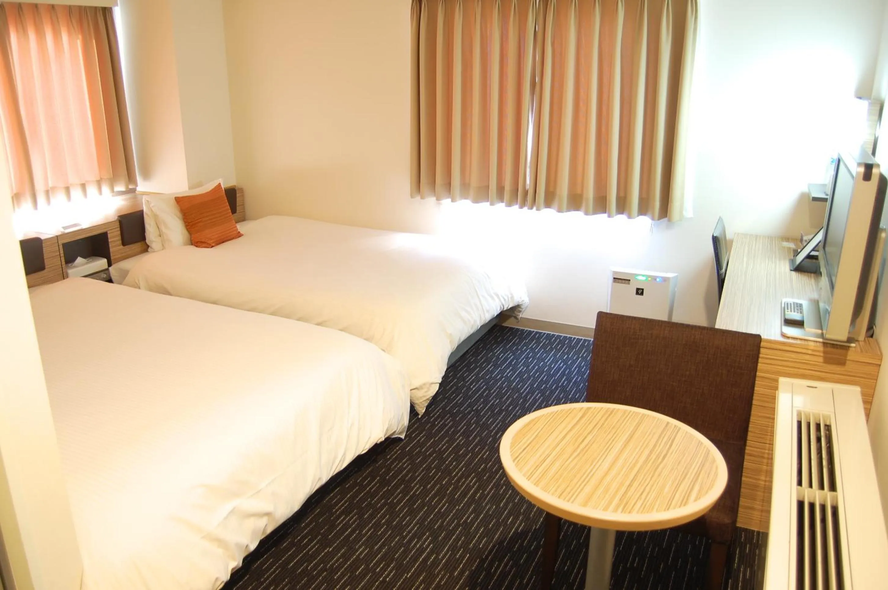 Photo of the whole room, Bed in Plaza Hotel Toyota