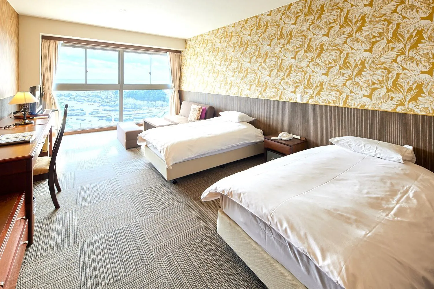 Bed in Shiosai Resort Kamogawa