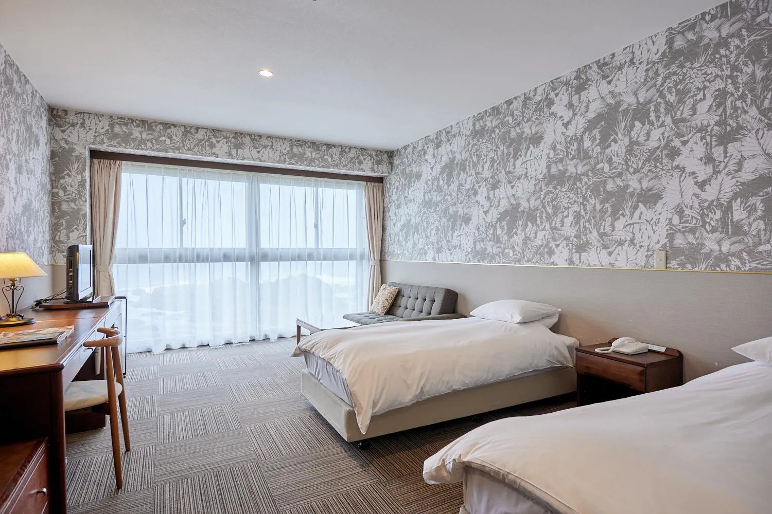 Bed in Shiosai Resort Kamogawa