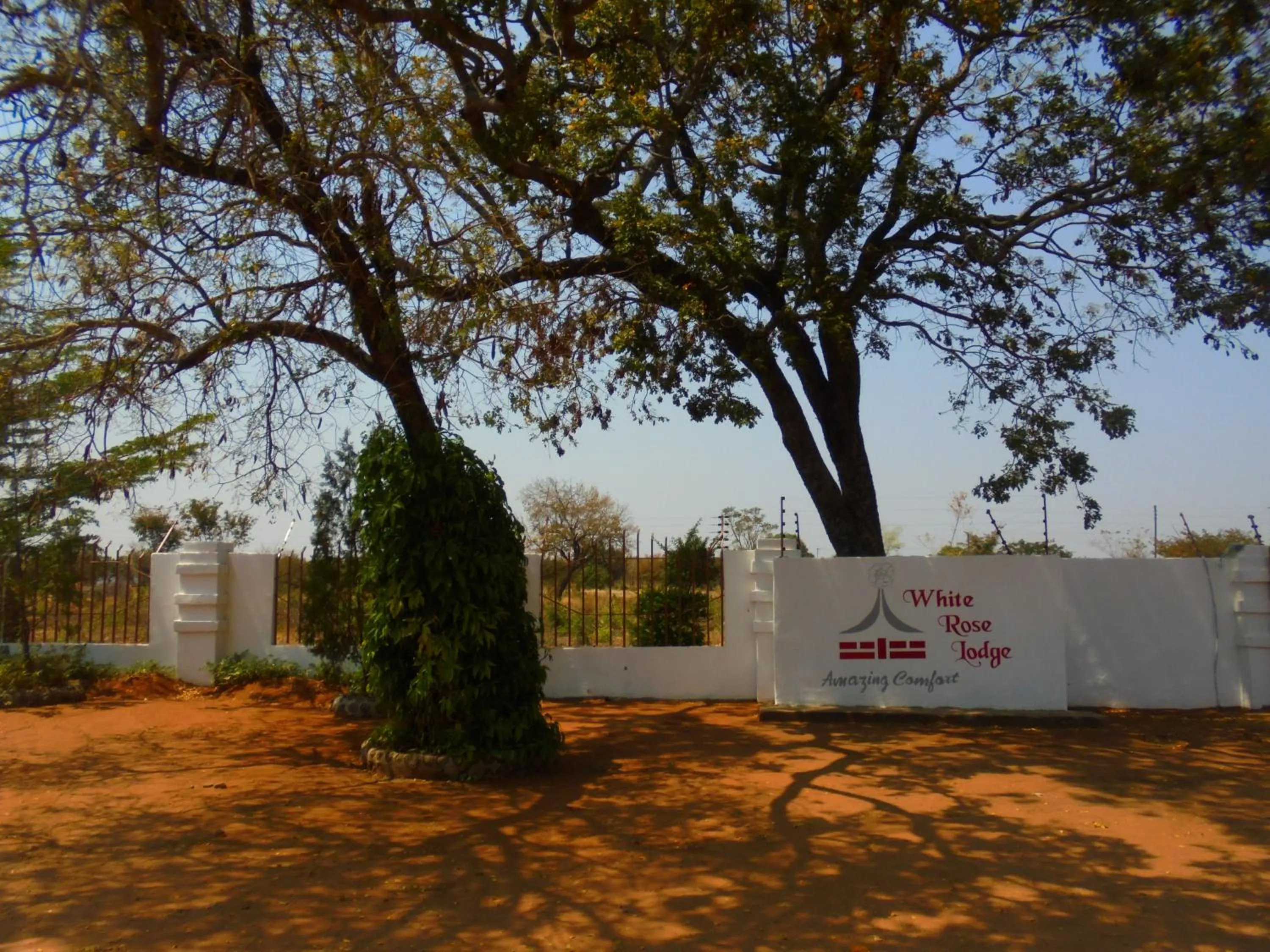 Property logo or sign in White Rose Lodge