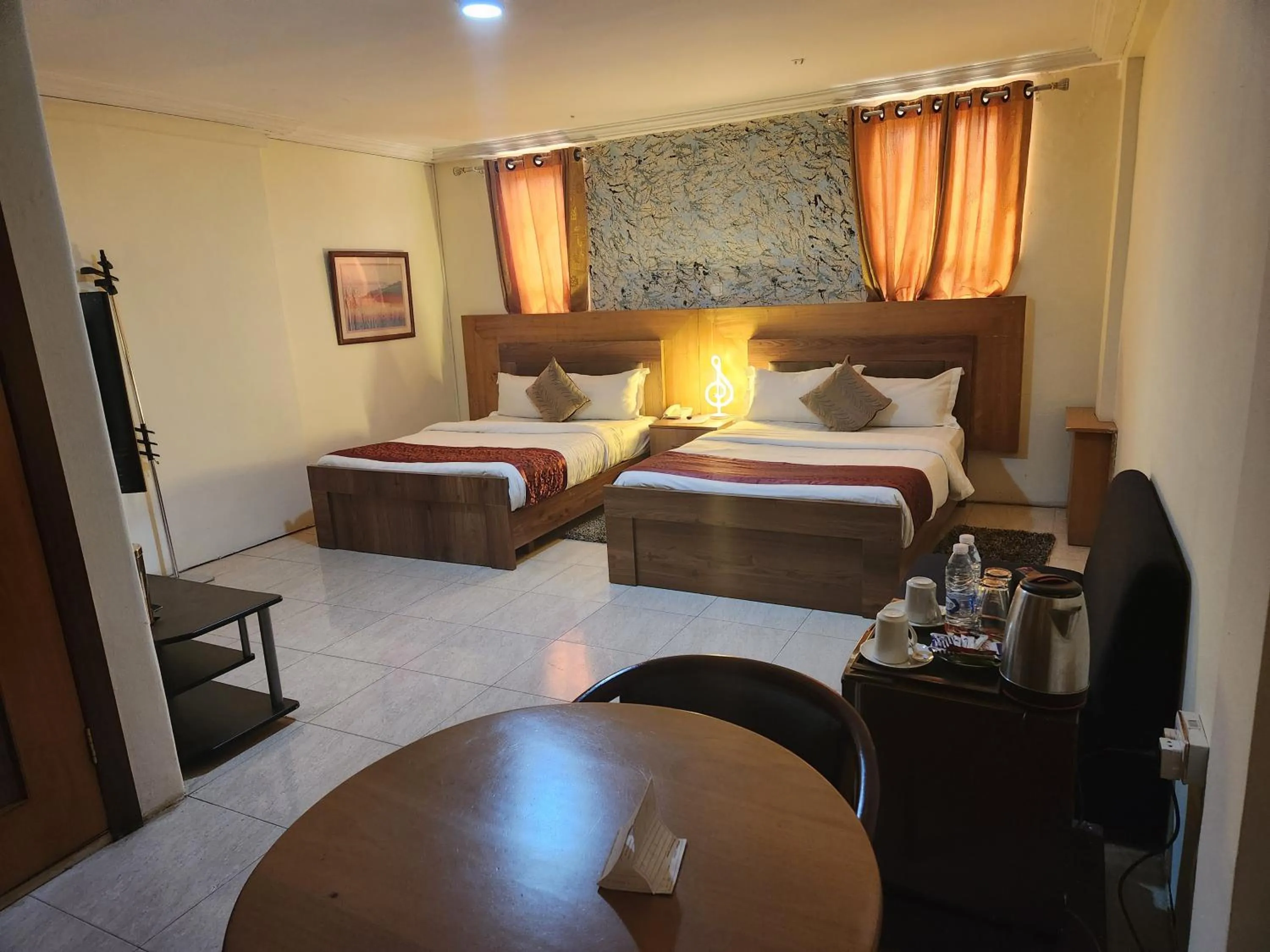 Bed in Sam's Cottage Hotel