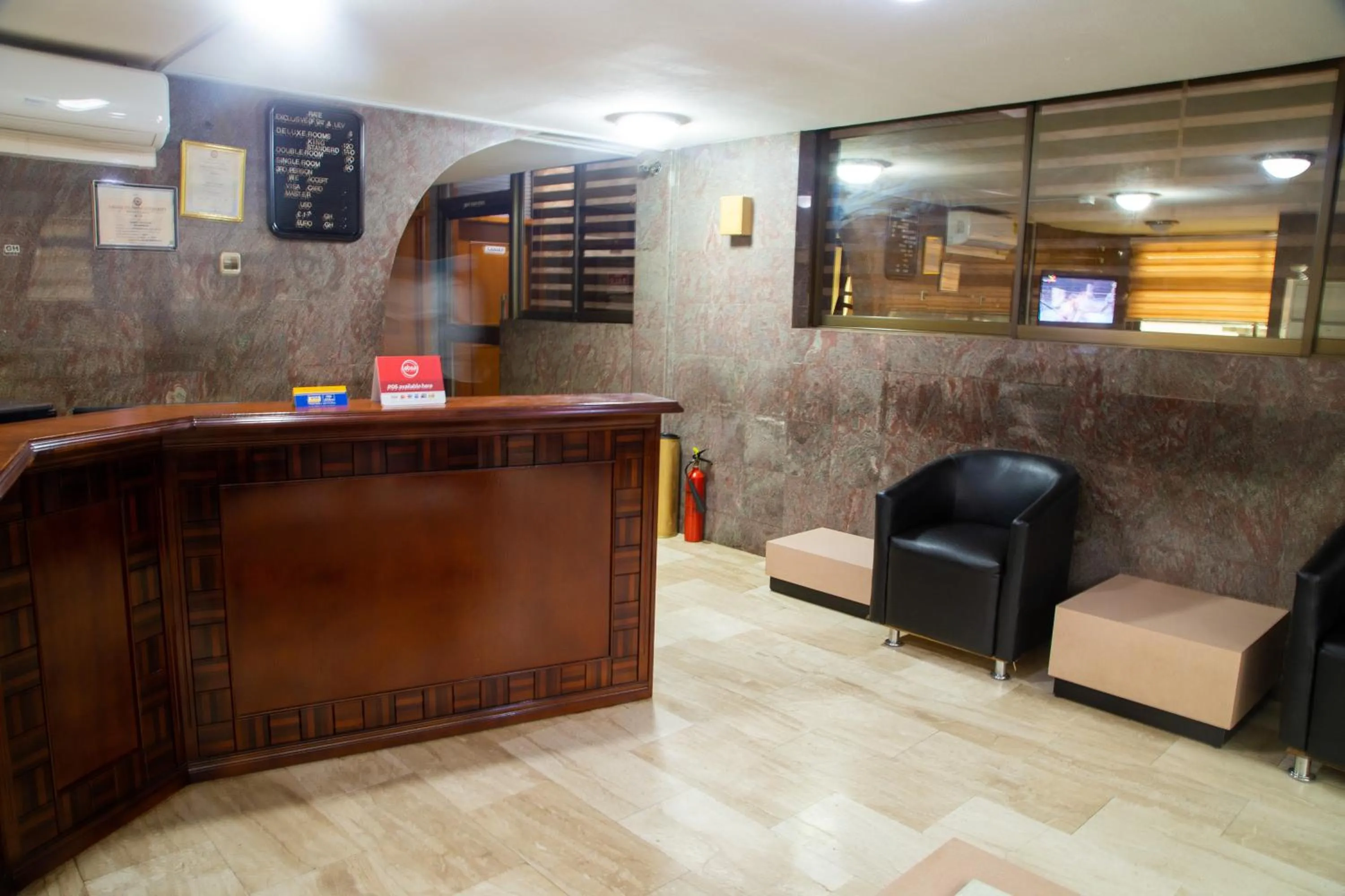 Lobby or reception in Sam's Cottage Hotel