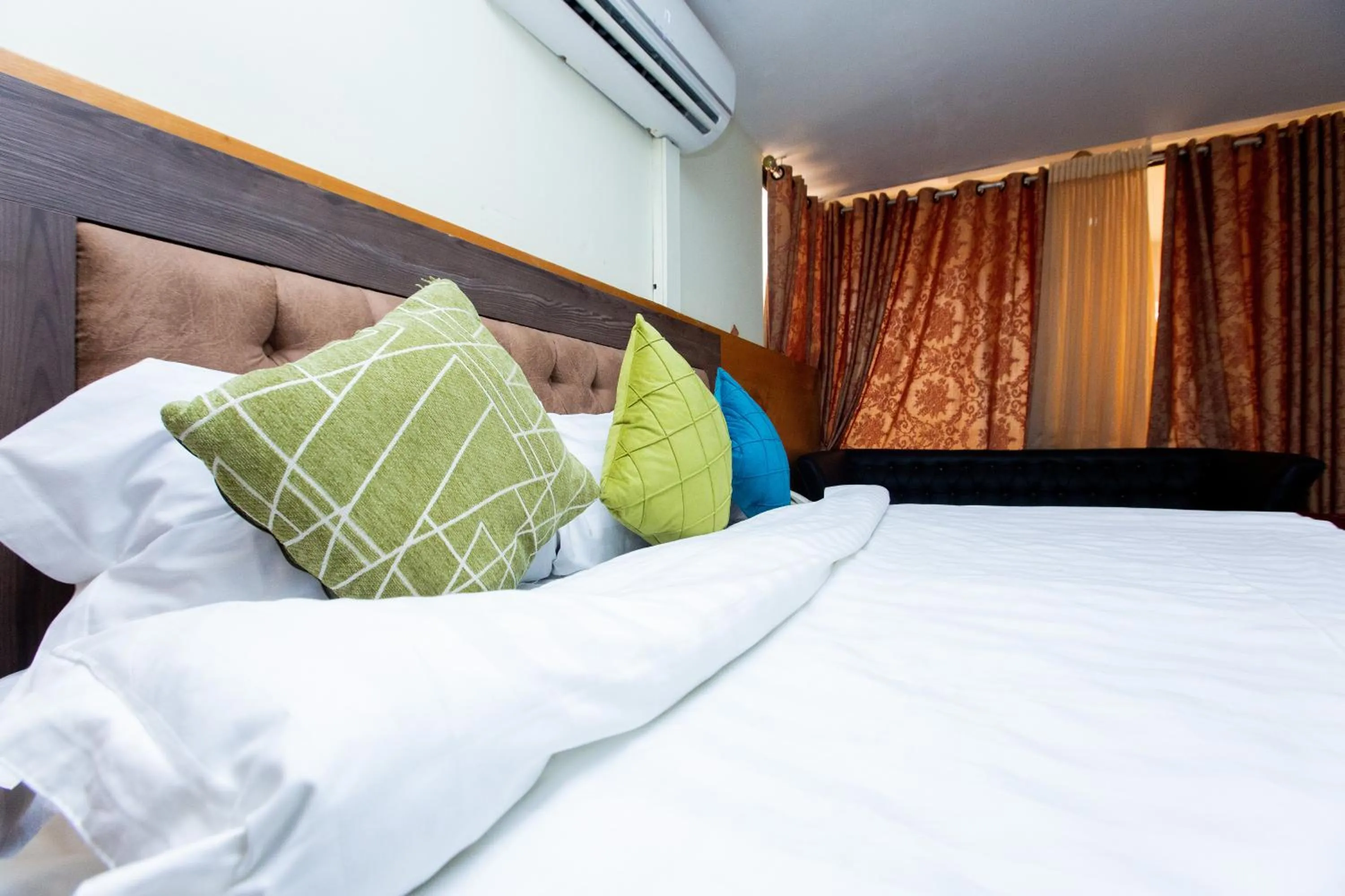 Bedroom in Sam's Cottage Hotel