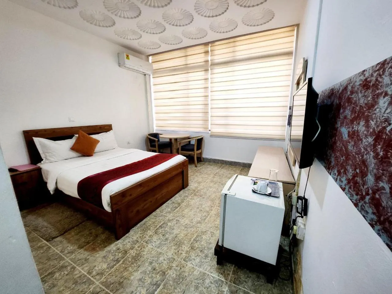 Bedroom in Sam's Cottage Hotel