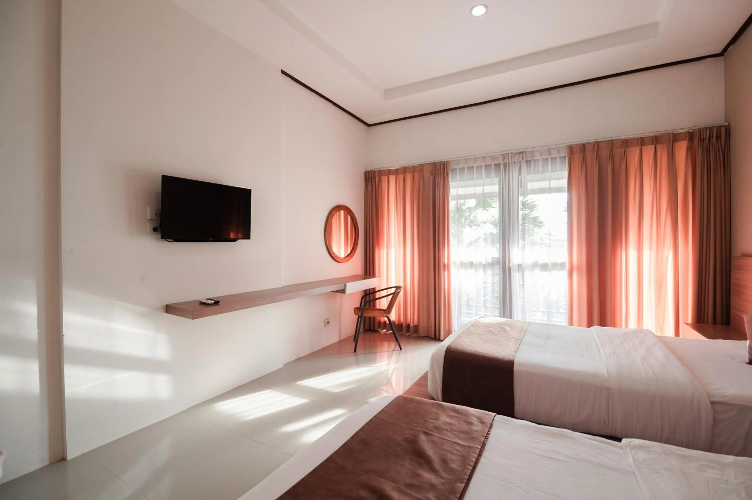 Bed in Surya Kencana Seaside Hotel