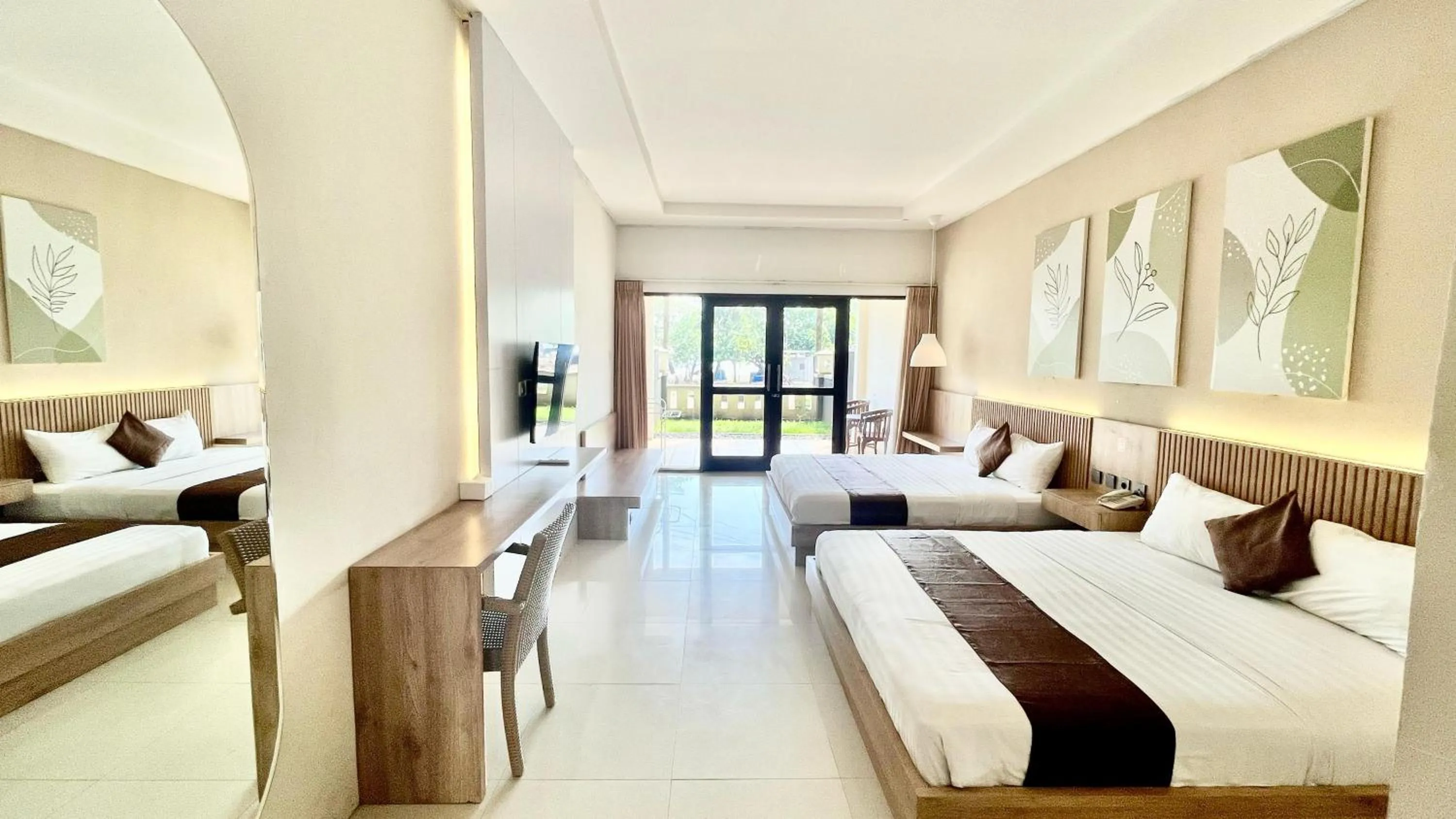 Bed in Surya Kencana Seaside Hotel