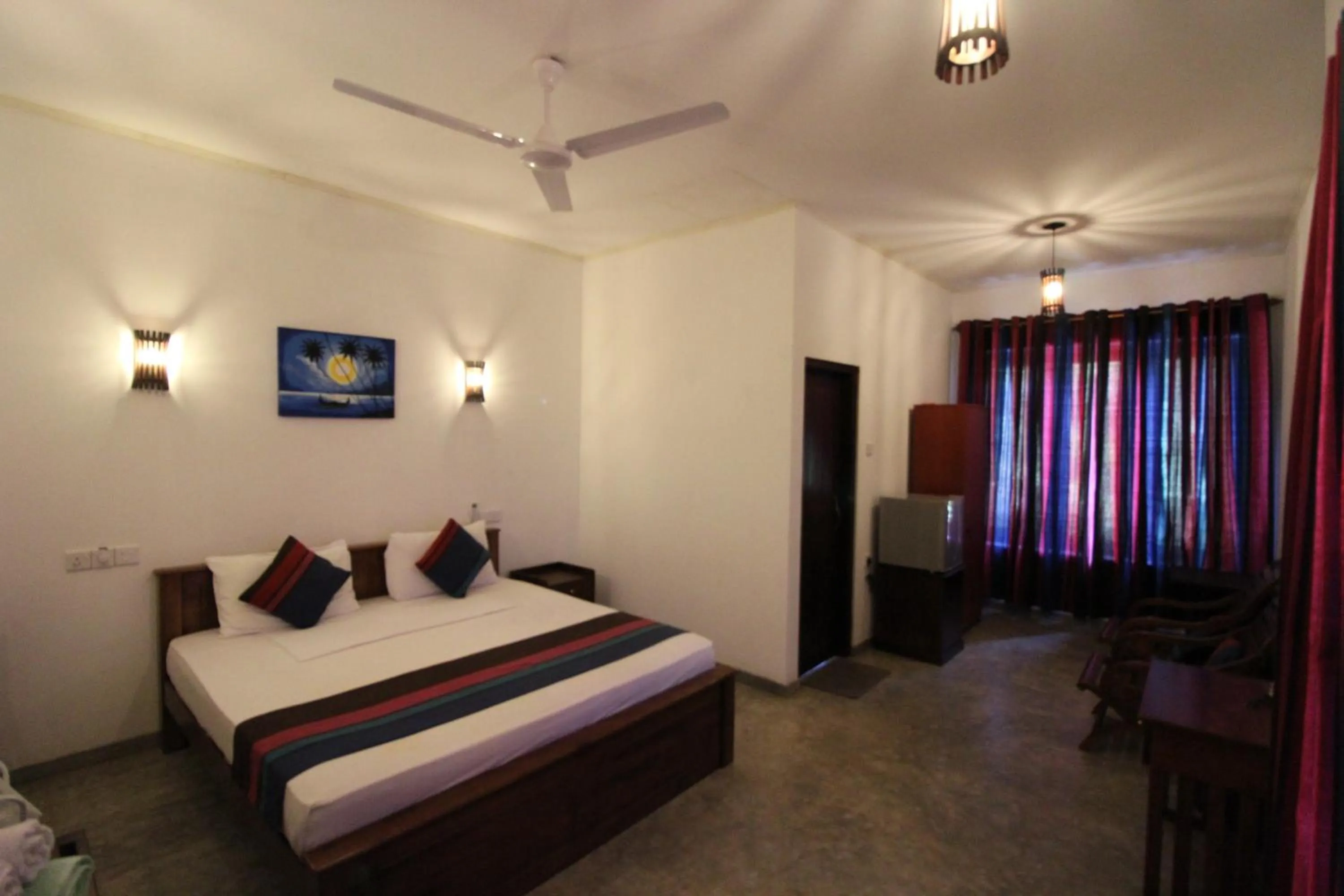 Photo of the whole room, Bed in Santori Unawatuna