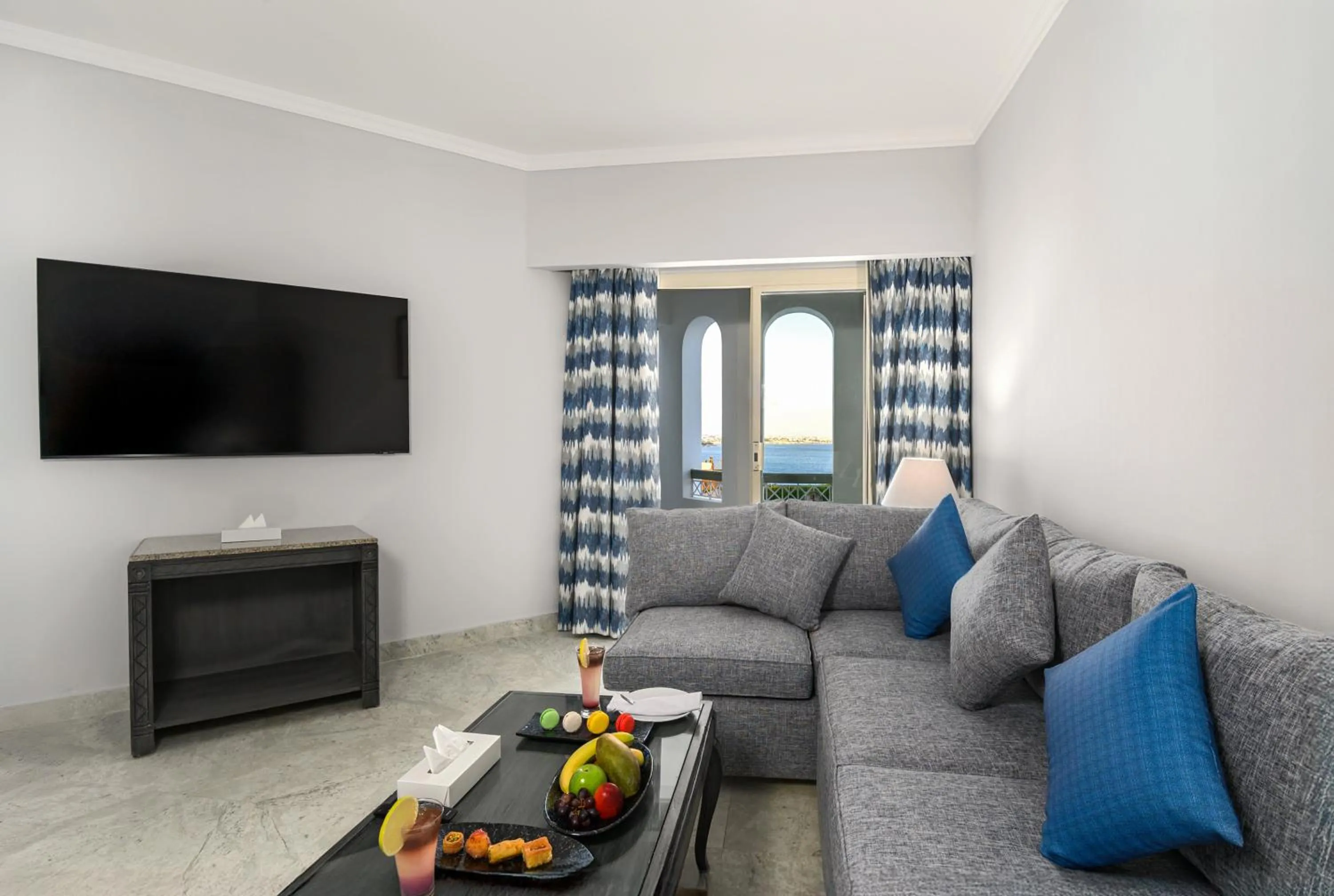 Living room in Invidia Coral Beach Tiran
