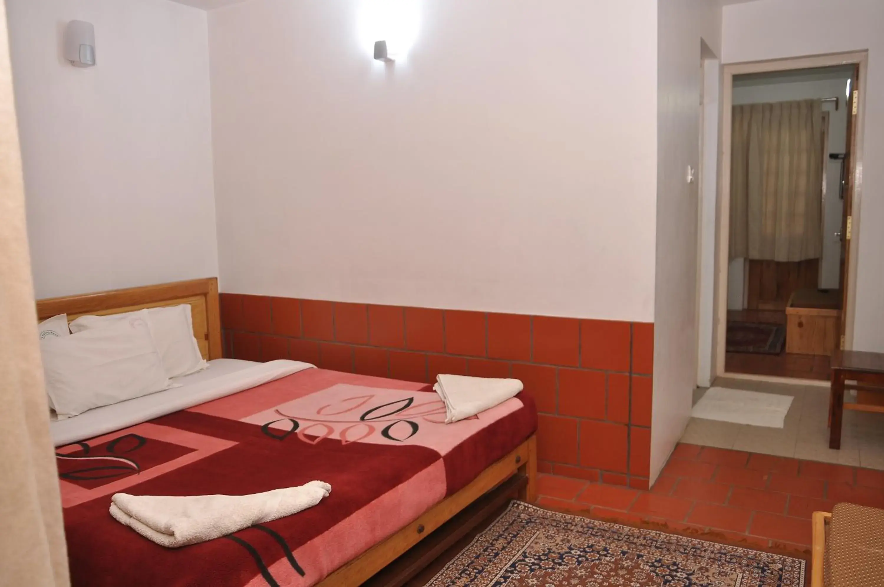 Bed in Lilly's Valley Resort Bed in Lilly's Valley Resort