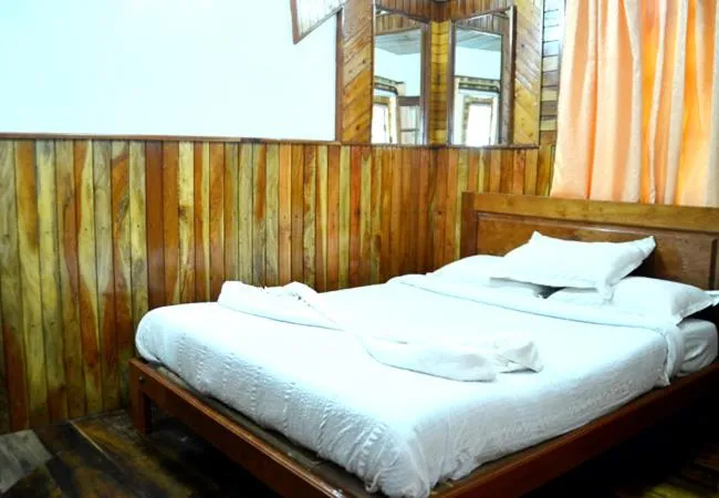 Bed in Lilly's Valley Resort