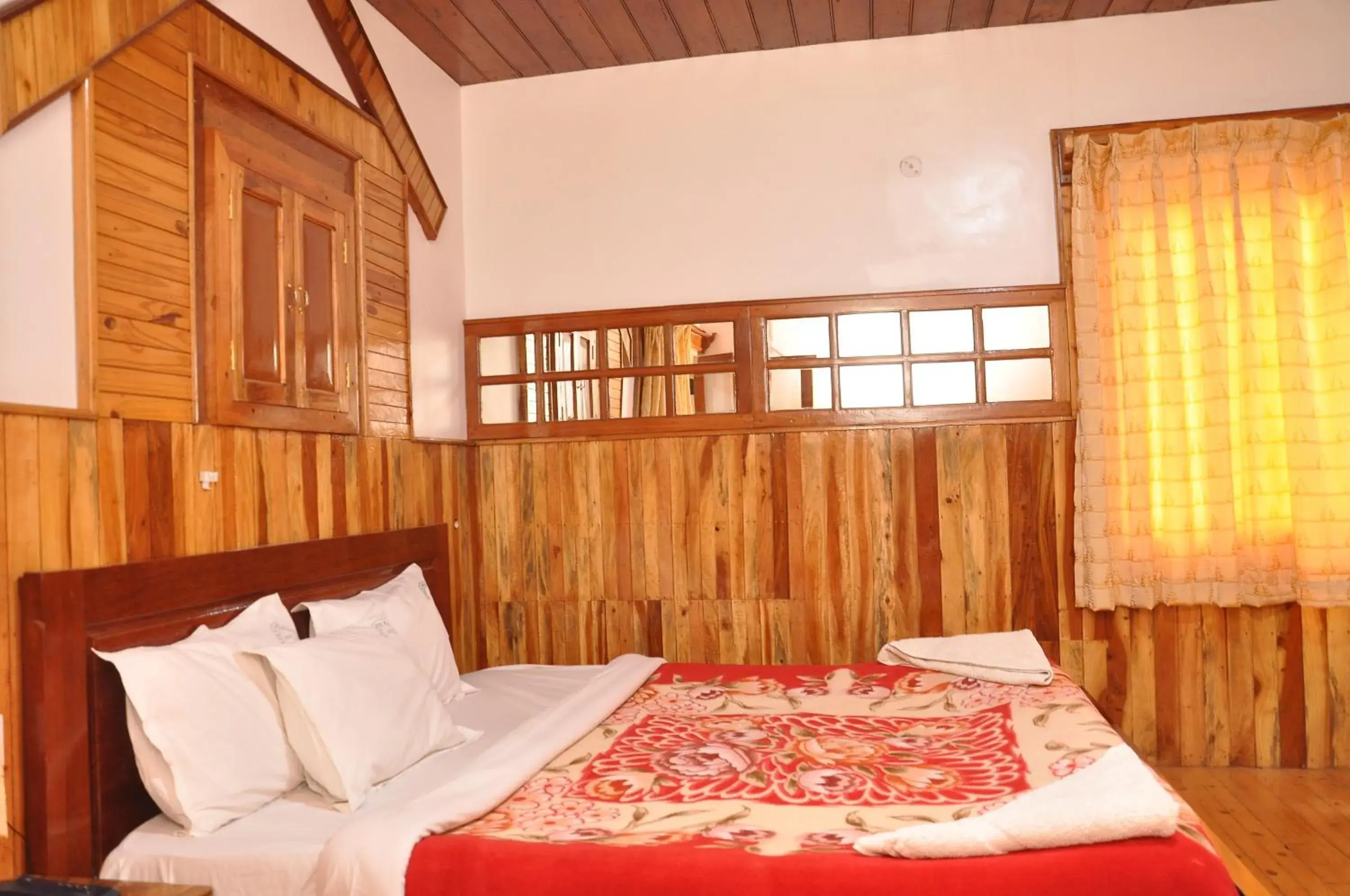 Bed in Lilly's Valley Resort Bed in Lilly's Valley Resort