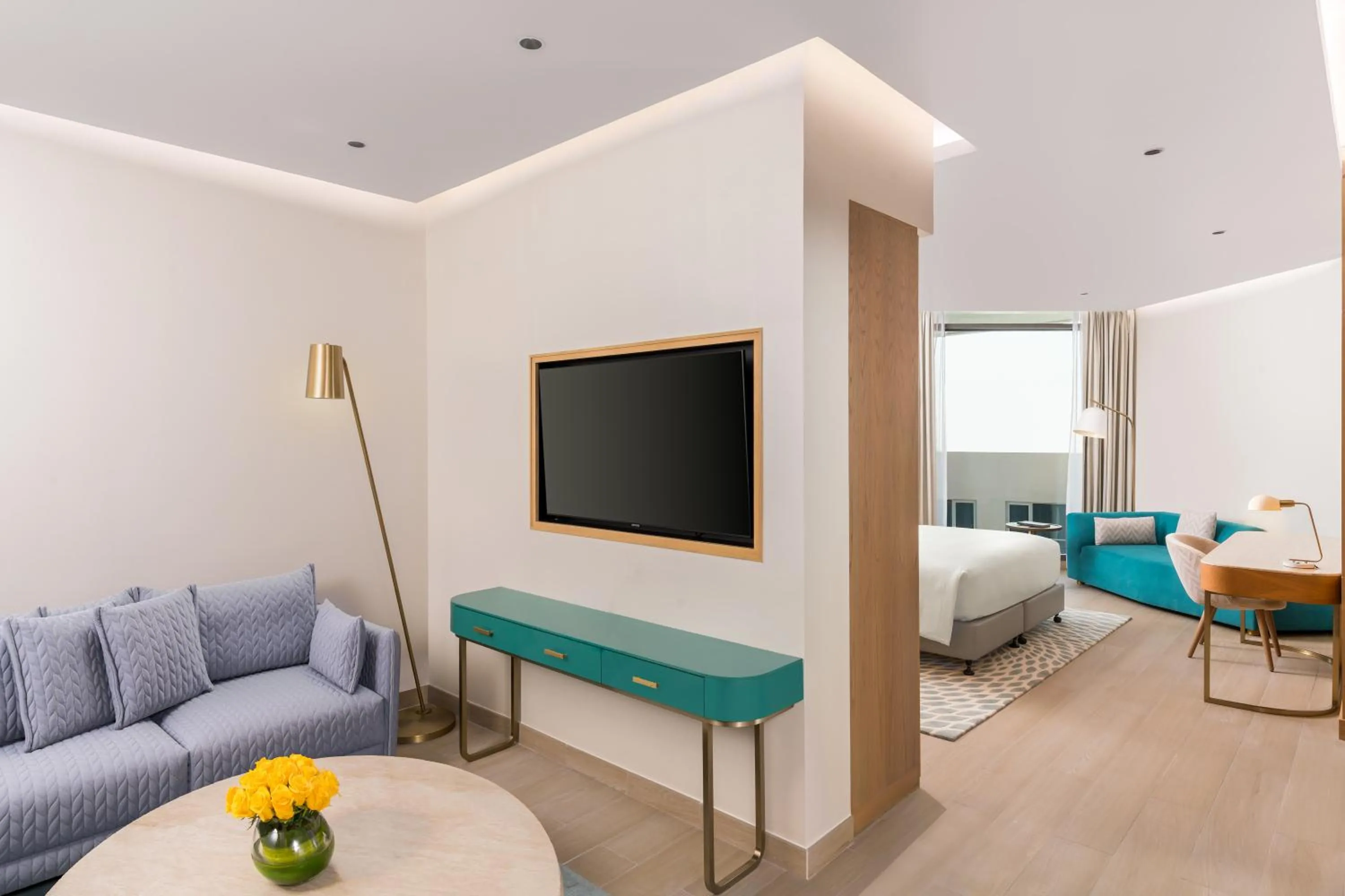 Seating area, Bed in voco Muscat Al Mouj by IHG