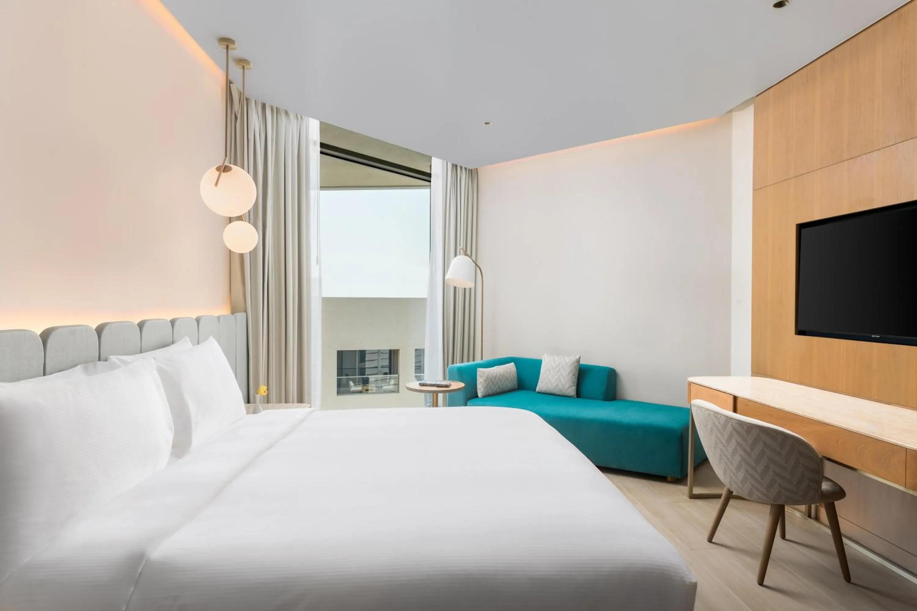Photo of the whole room, Bed in voco Muscat Al Mouj by IHG
