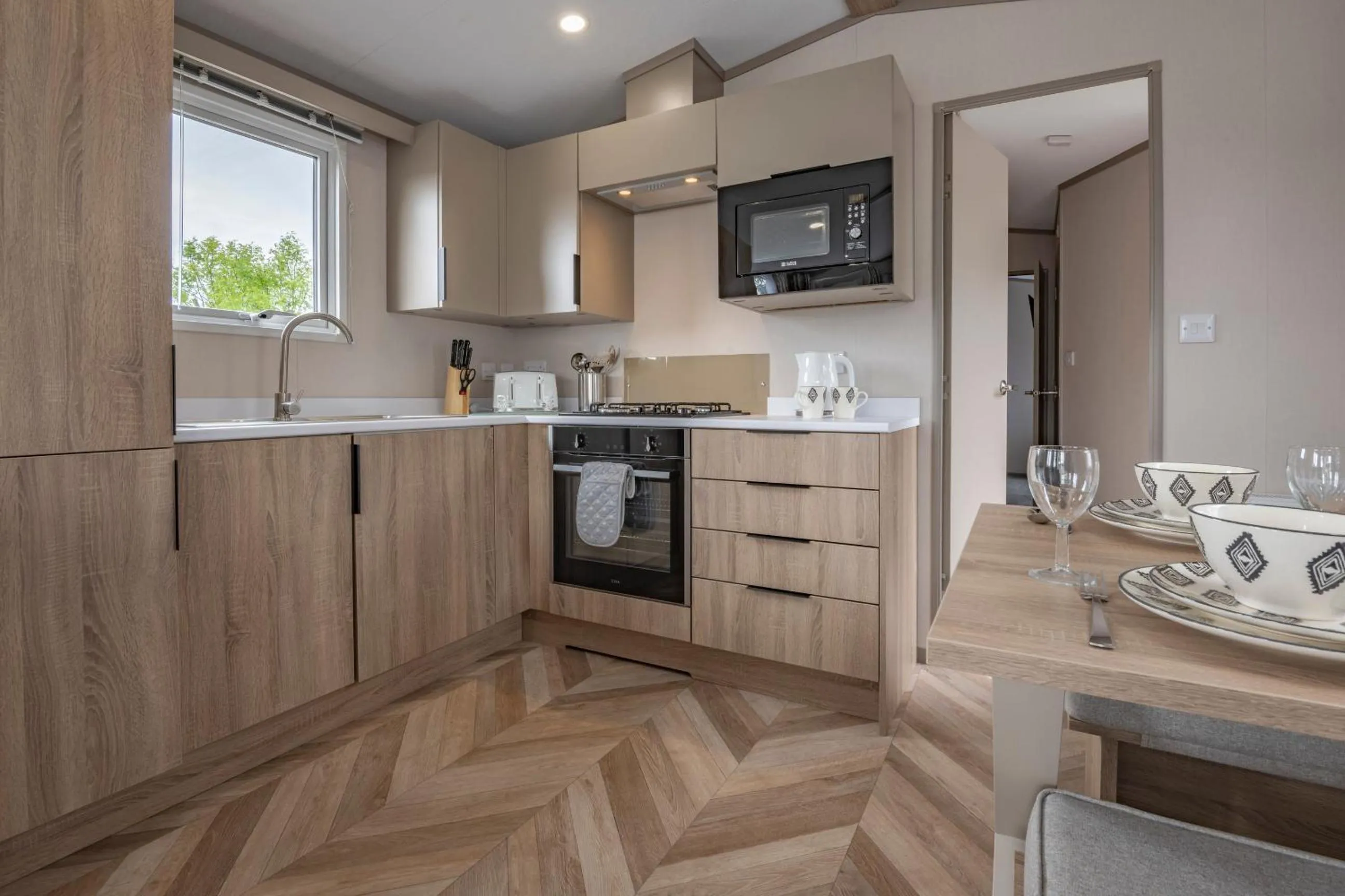 Kitchen or kitchenette in Tan Rallt Holiday Park & Spa