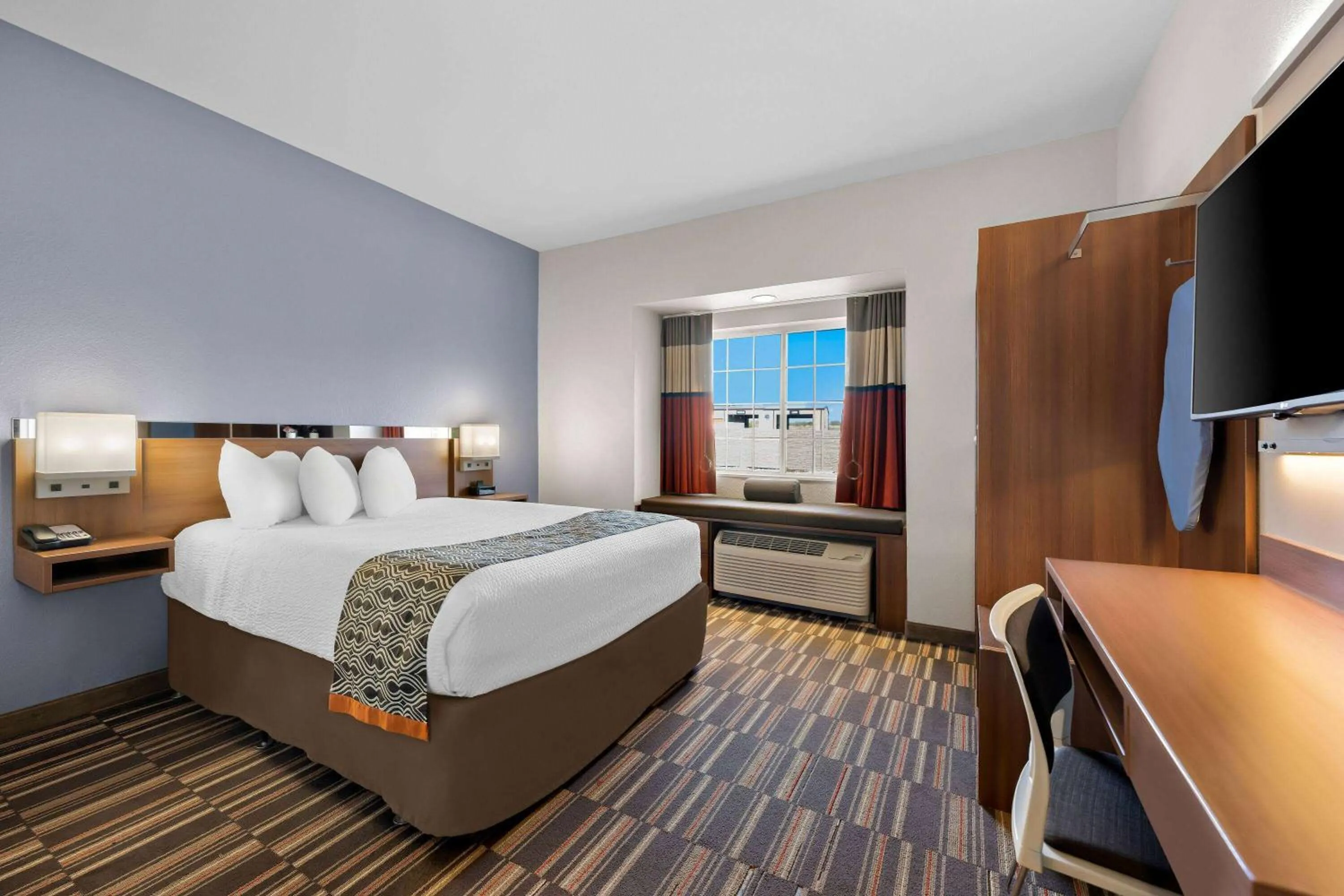 Bed in Microtel Inn & Suites by Wyndham Sweetwater