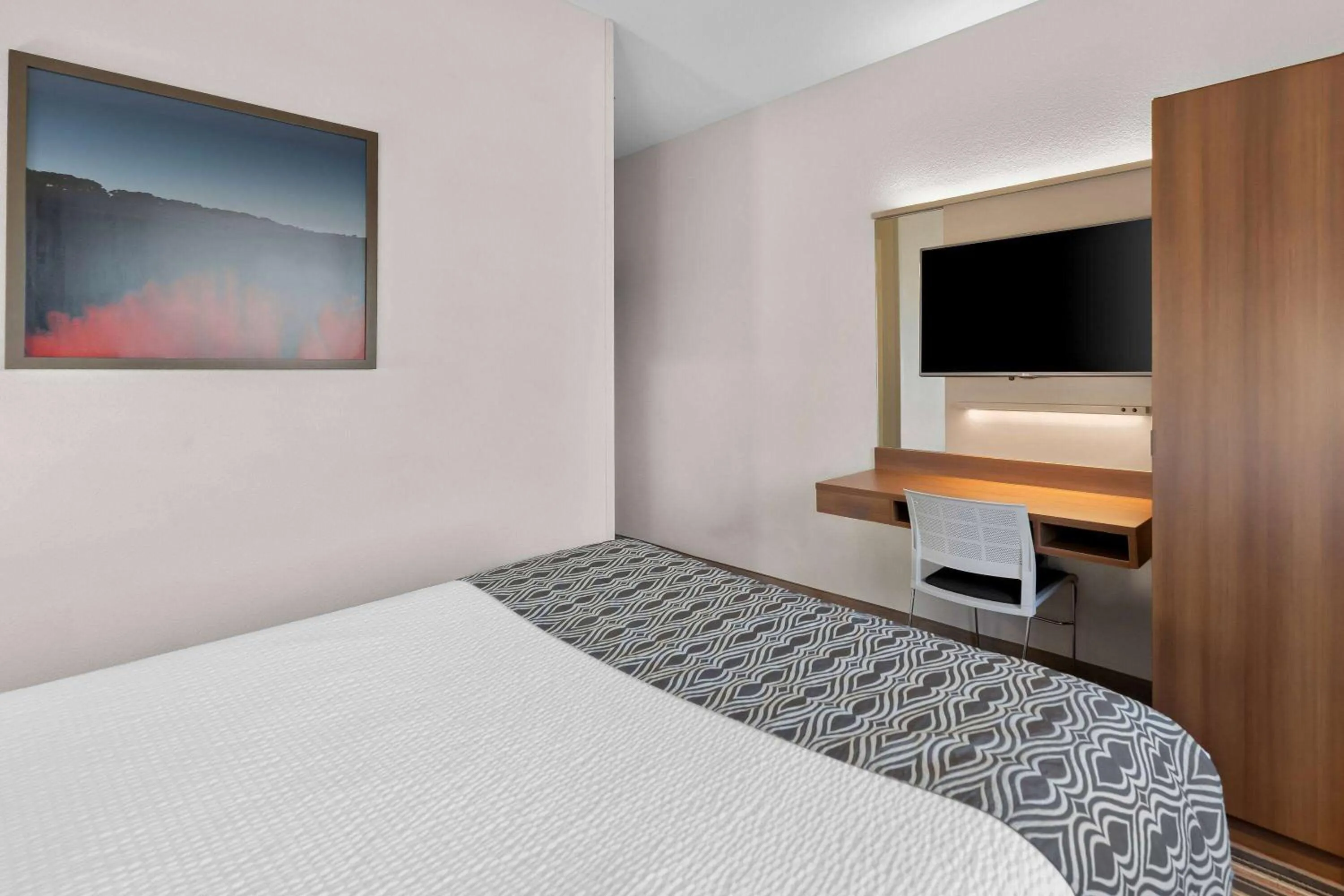 Bed in Microtel Inn & Suites by Wyndham Sweetwater