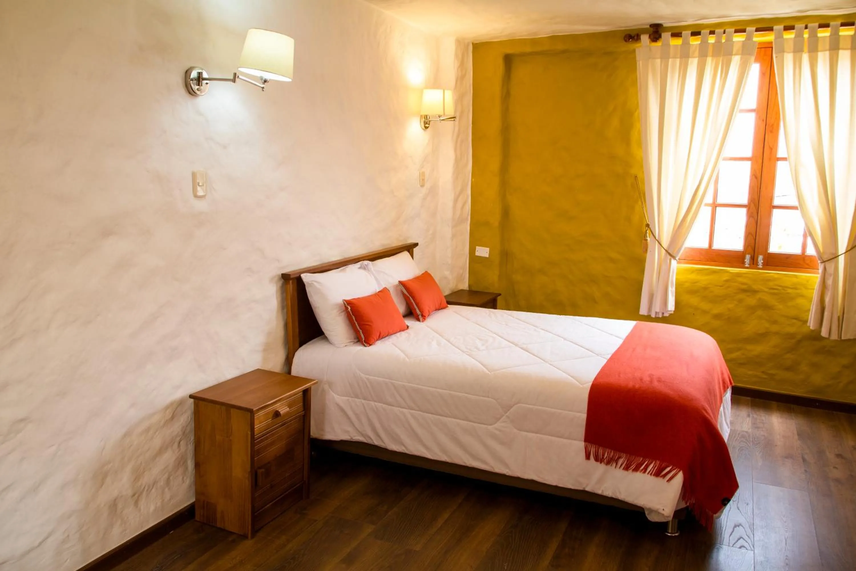 Bed in La Casa de Santiago Hotel