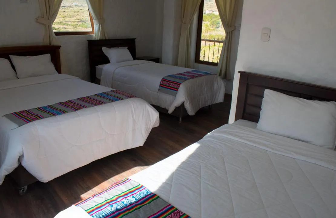 Bed in La Casa de Santiago Hotel