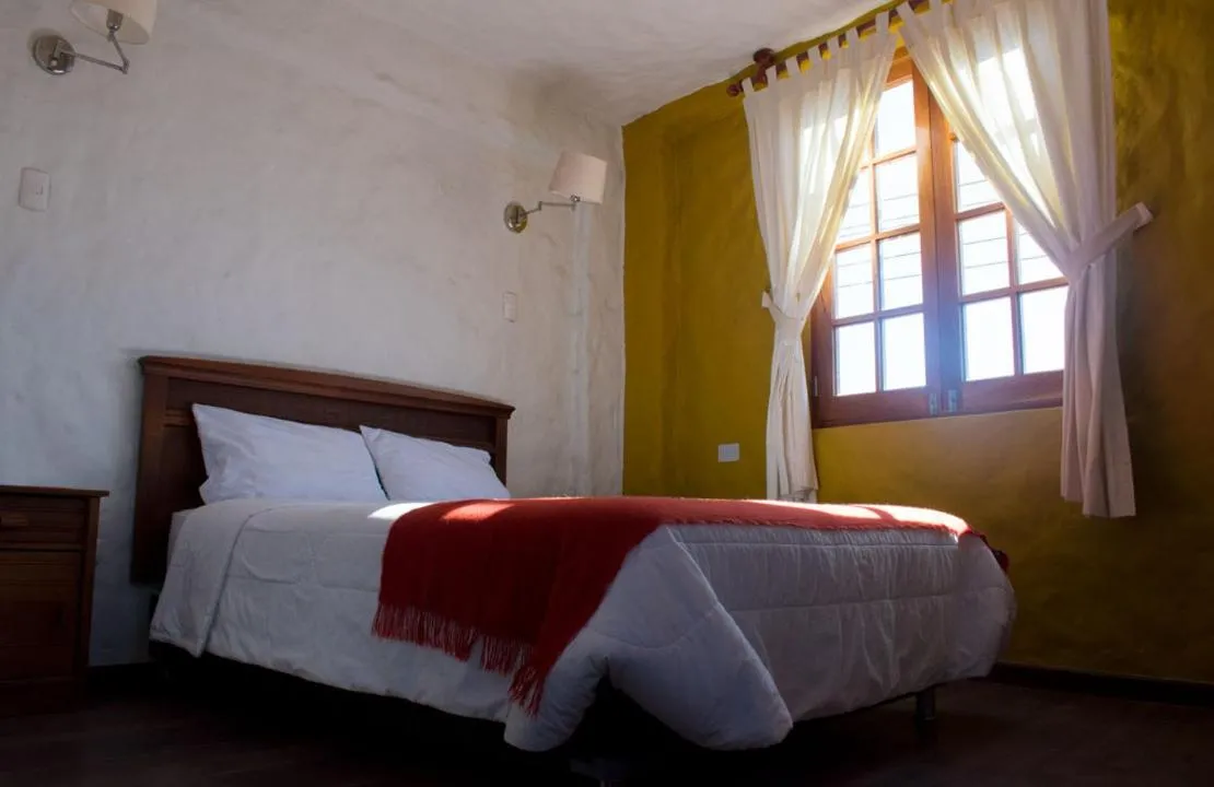 Bed in La Casa de Santiago Hotel