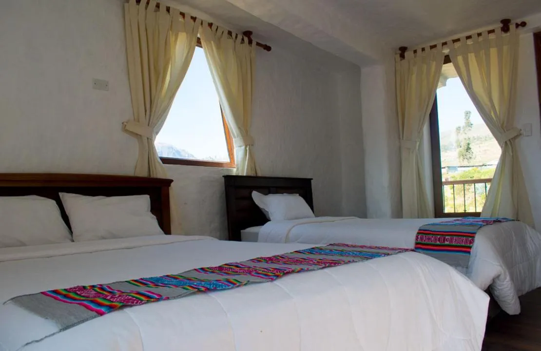 Photo of the whole room, Bed in La Casa de Santiago Hotel