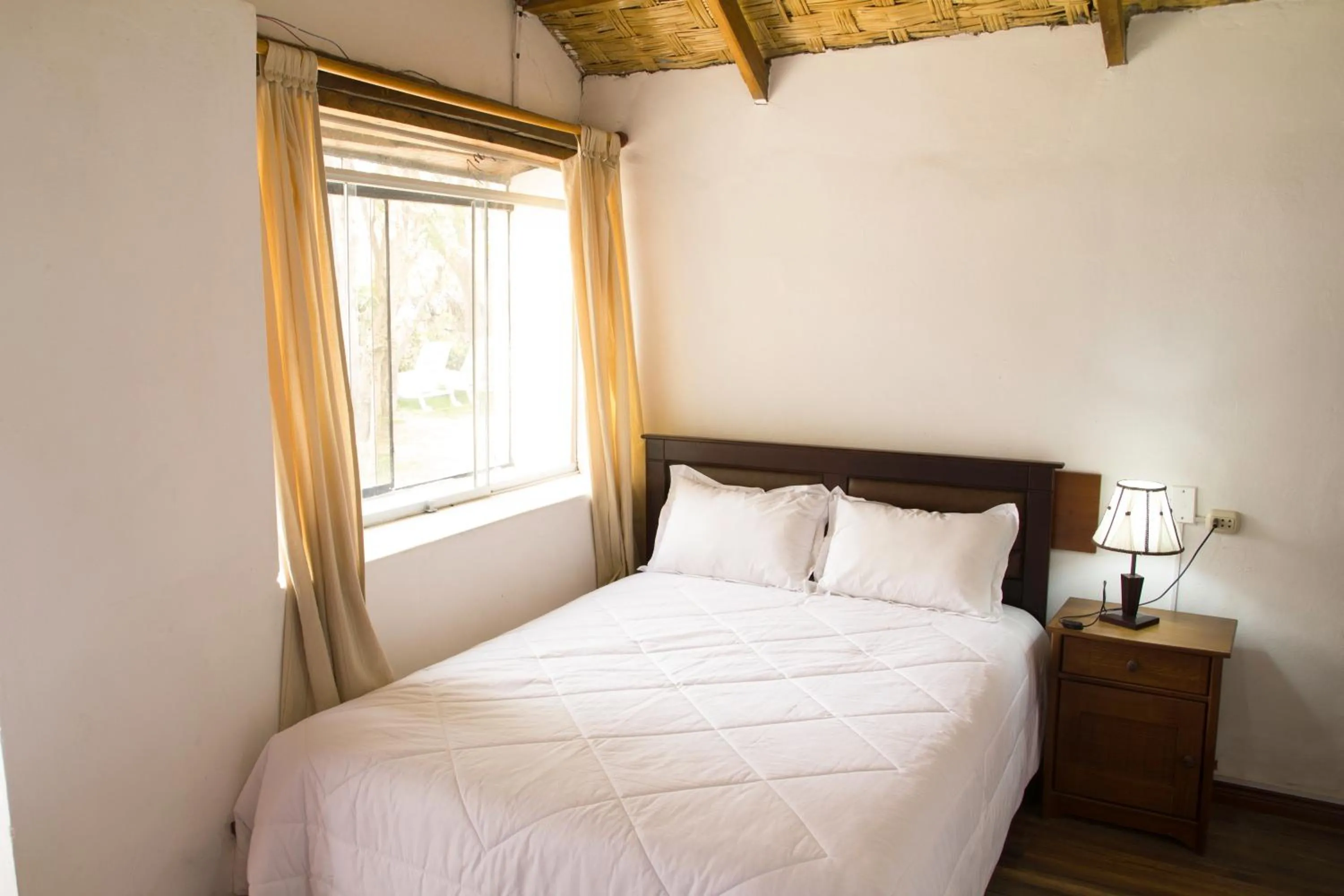 Photo of the whole room, Bed in La Casa de Santiago Hotel