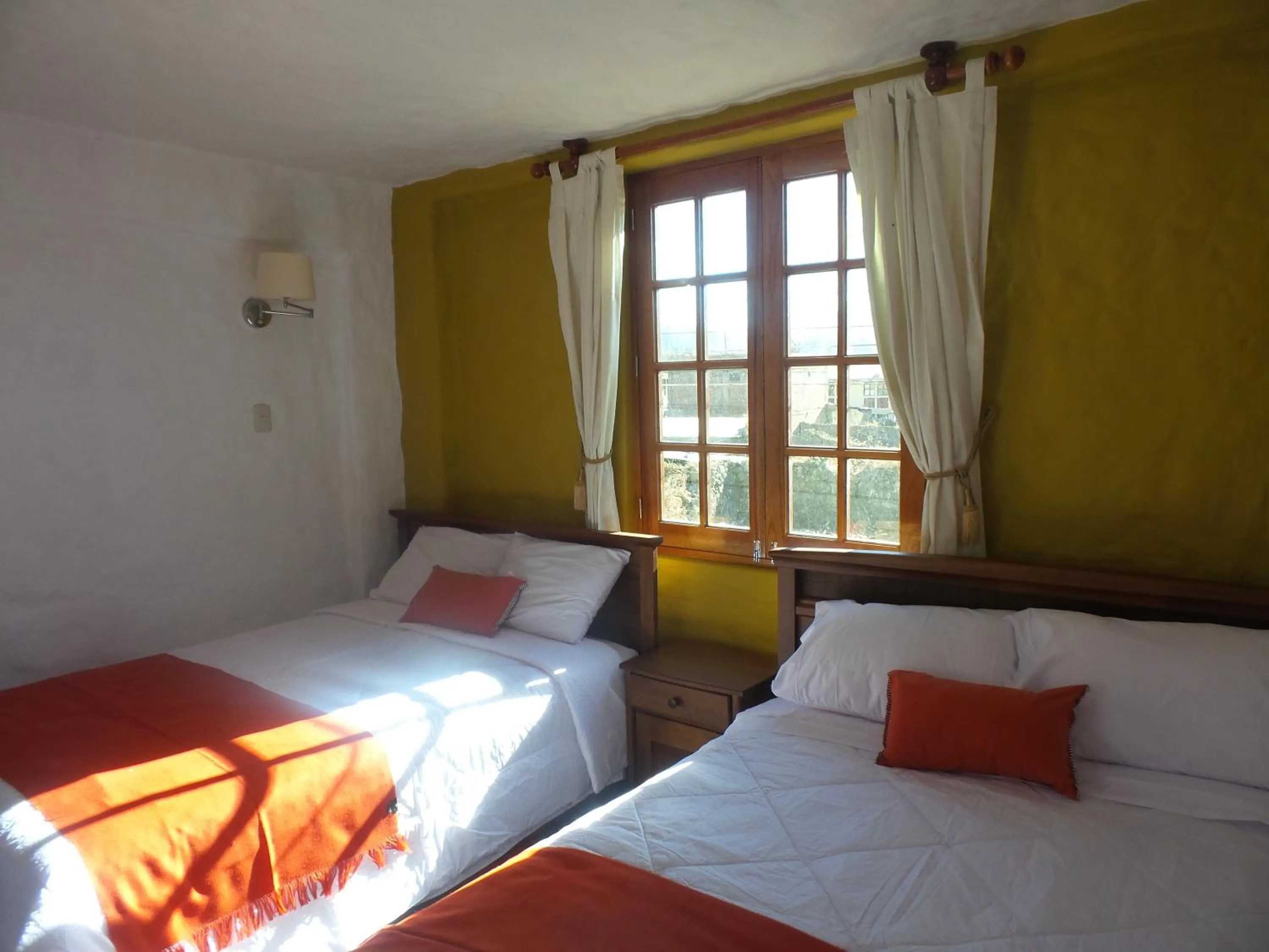 Photo of the whole room, Bed in La Casa de Santiago Hotel