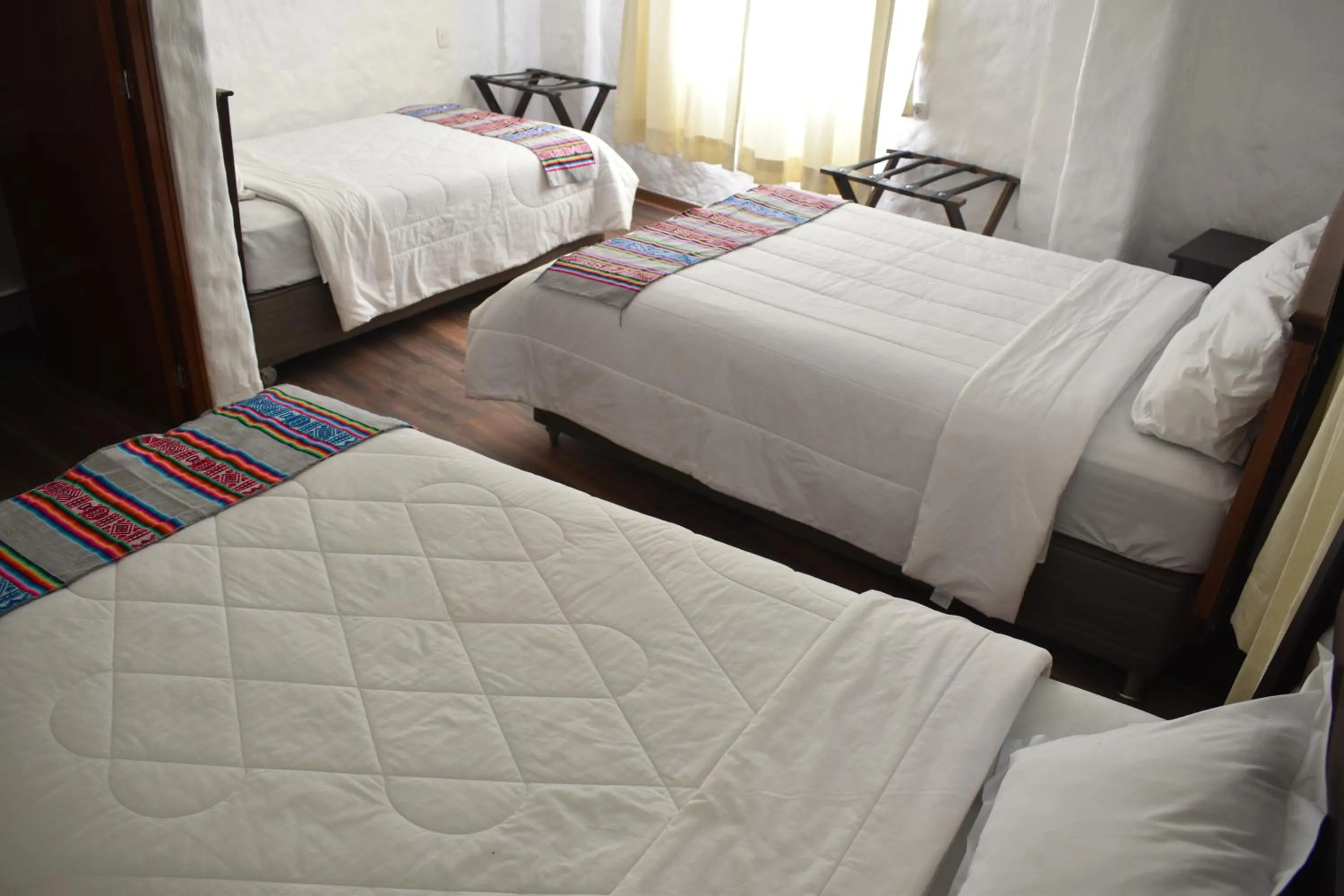 Bed in La Casa de Santiago Hotel