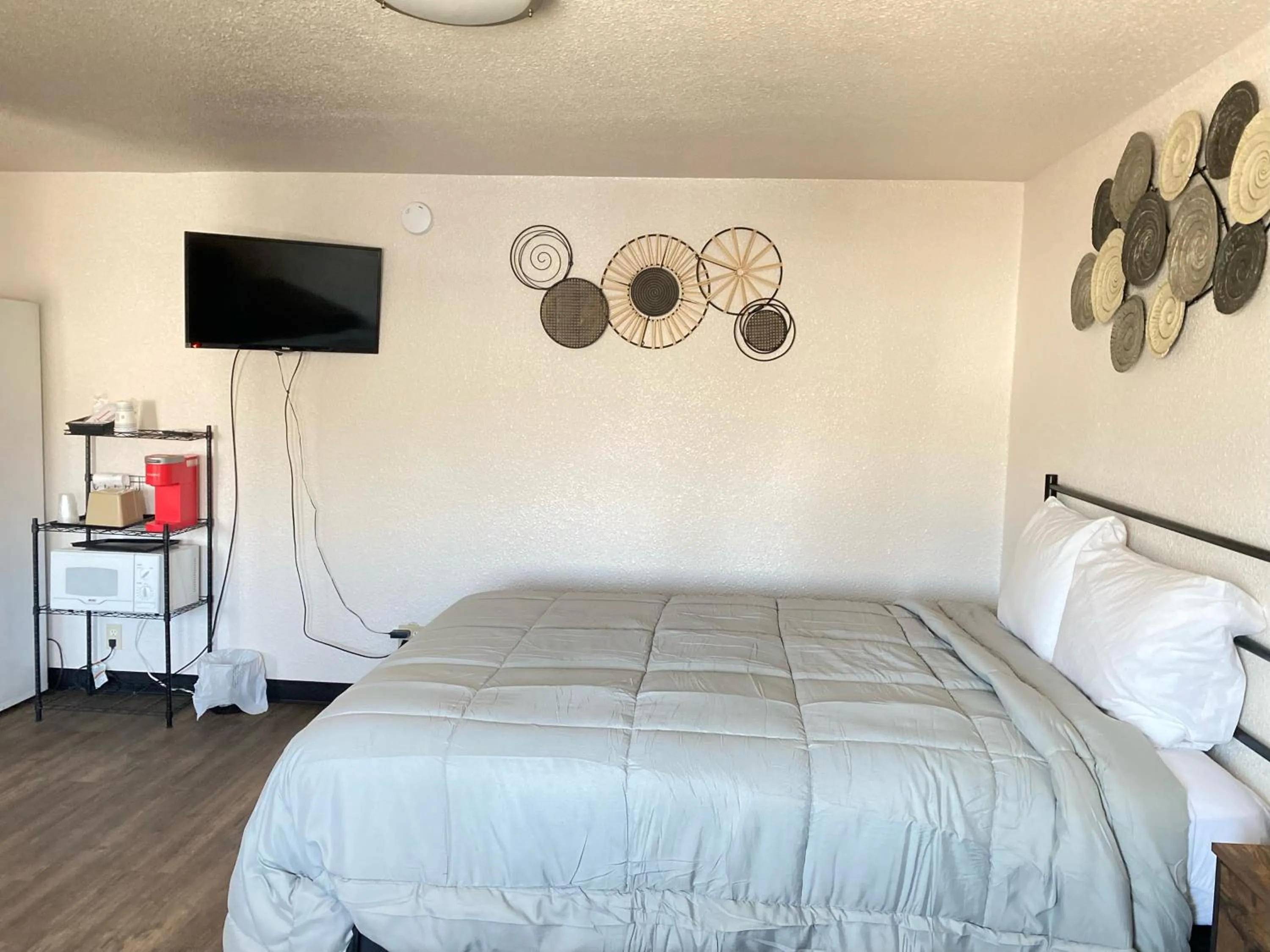 Bed in Baker City Motel & RV