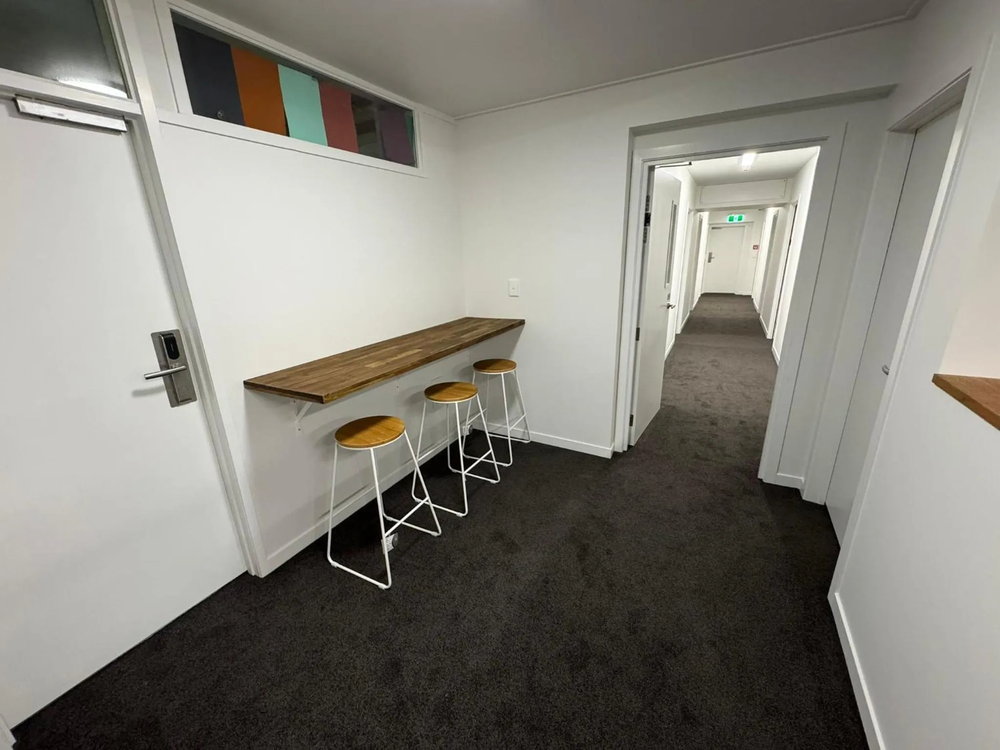 Communal lounge/ TV room in Backpackers Central Hamilton