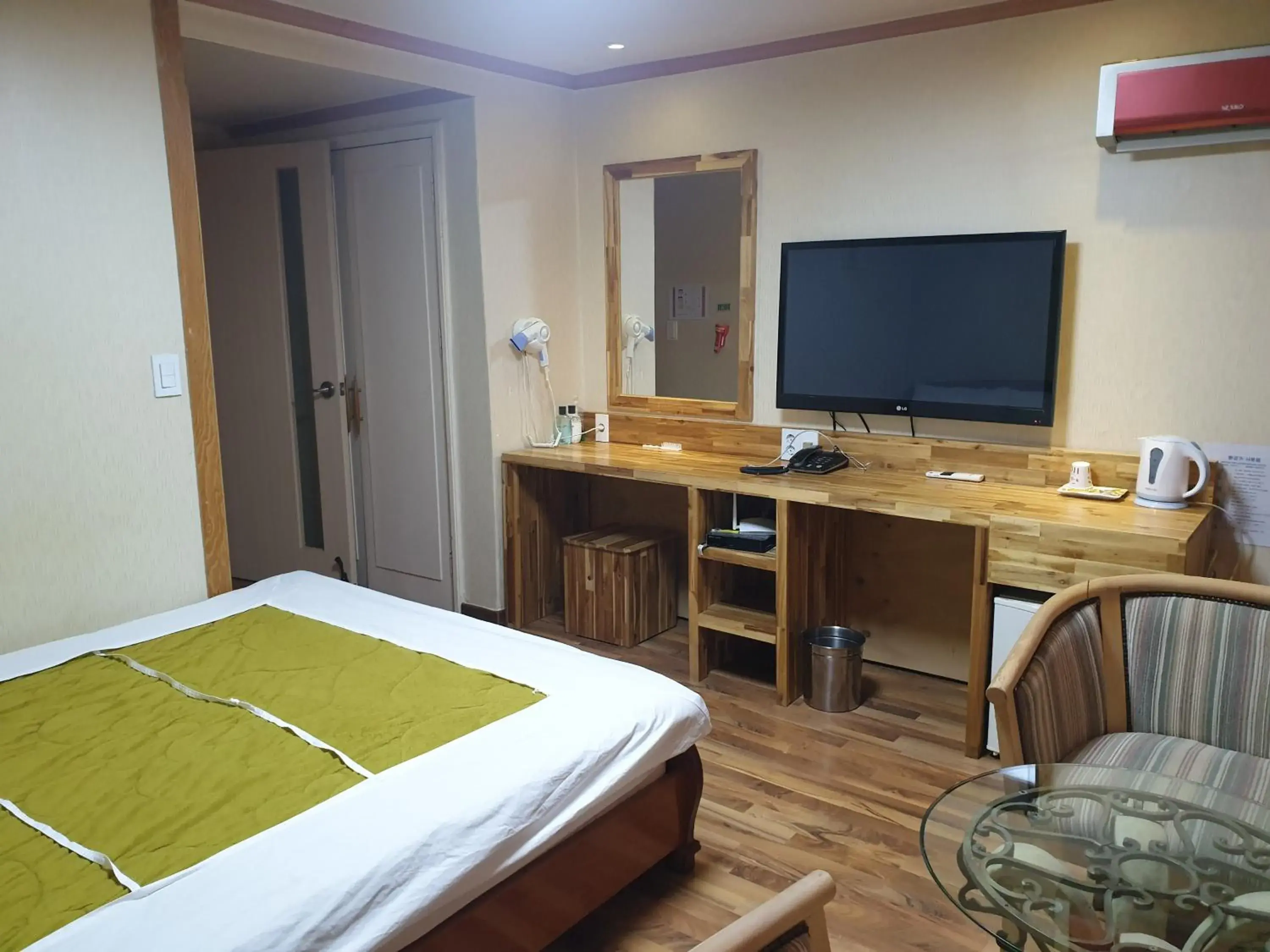 Bed in Green and Blue Hotel Bed in Green and Blue Hotel