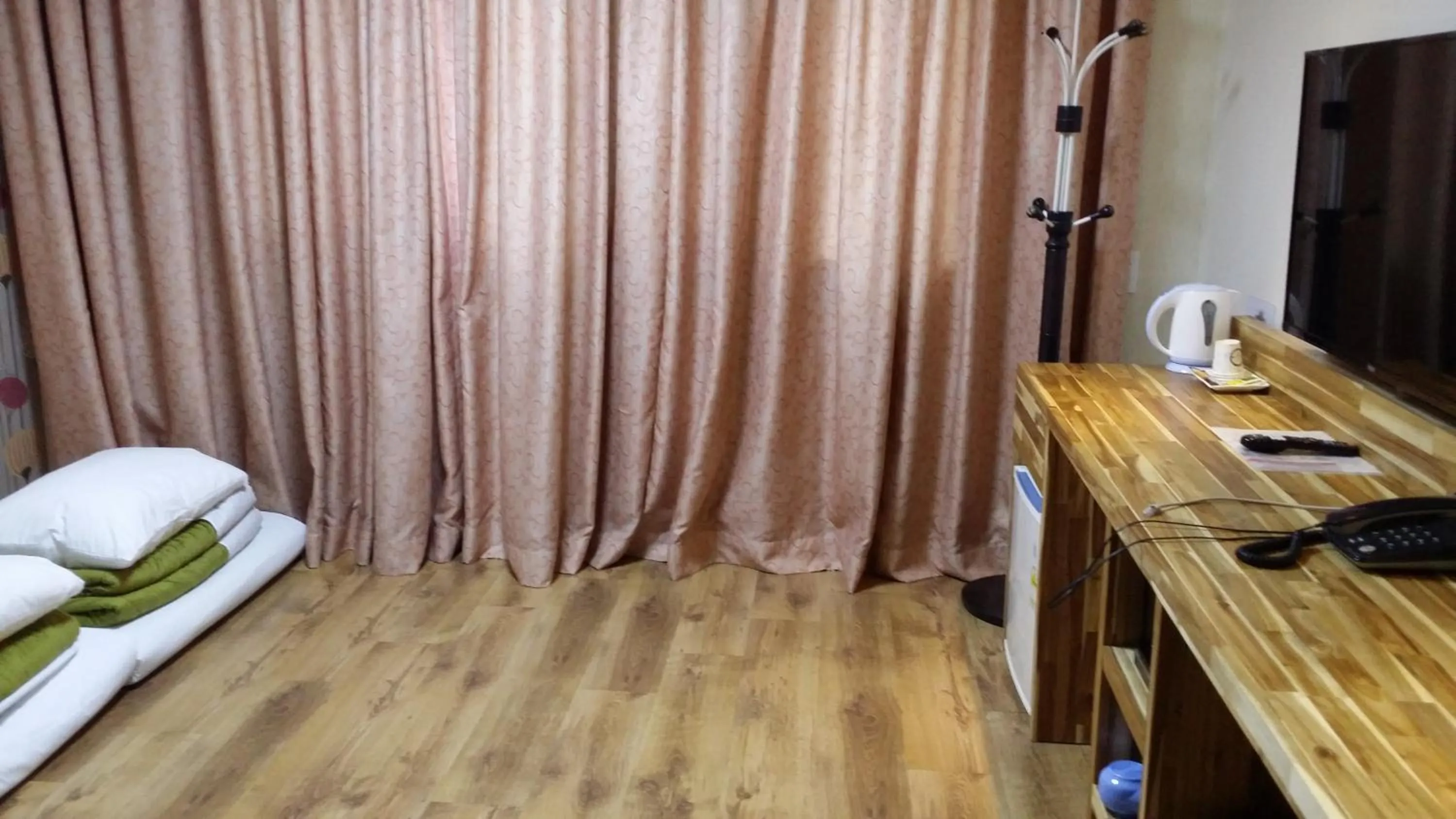 Bed in Green and Blue Hotel