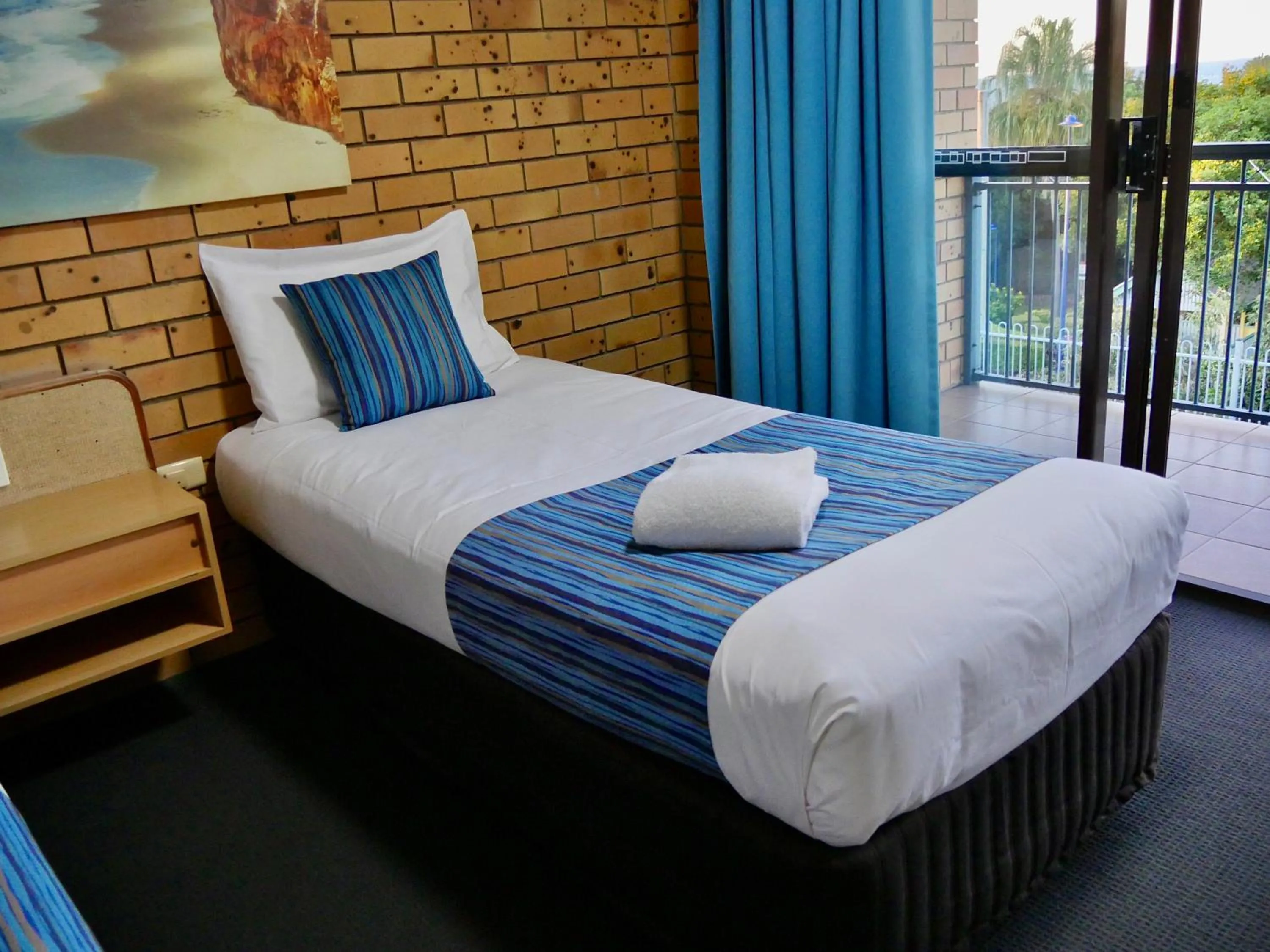 Bed in Tannum On The Beach Motel