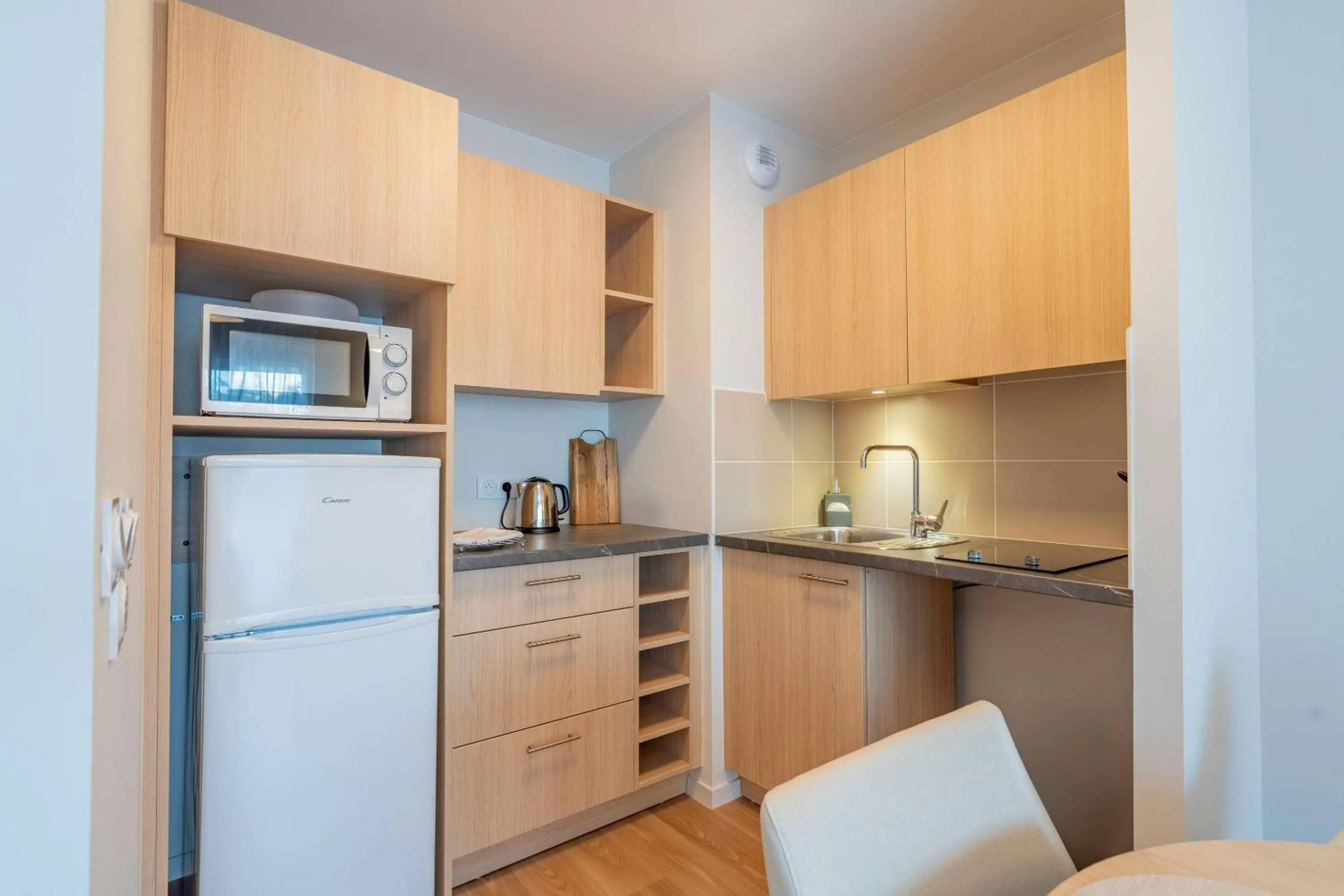 Kitchen or kitchenette in Quality Aparthotel Périgueux