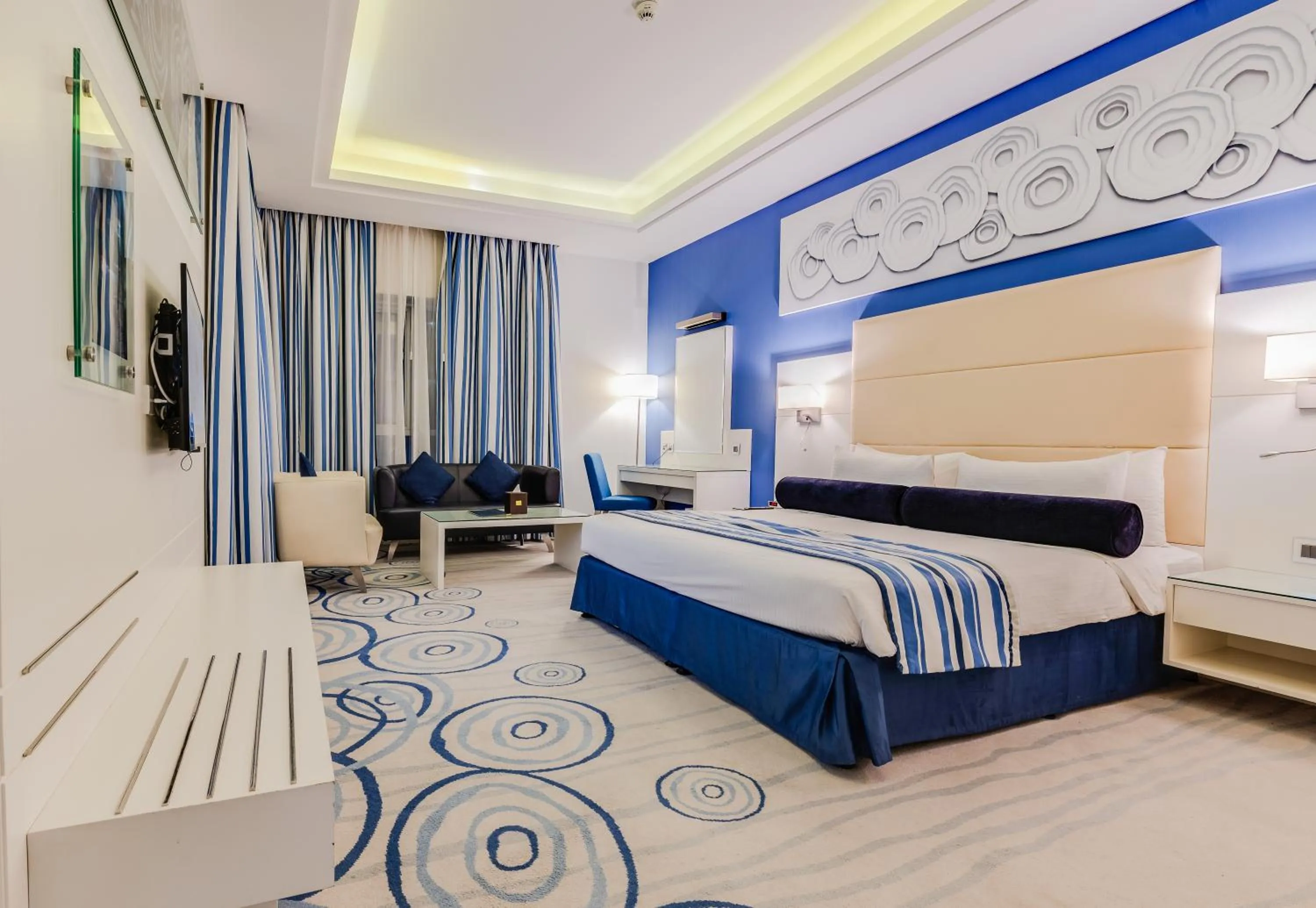 Photo of the whole room in Golden Tulip Downtown Abu Dhabi