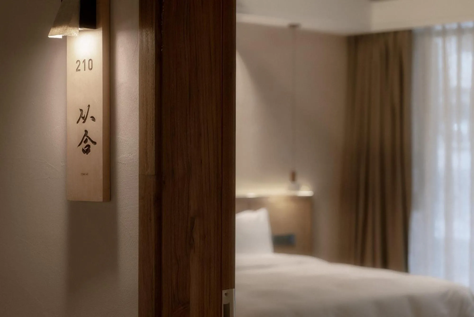 Bed in Shishe Spring Designer Homestay