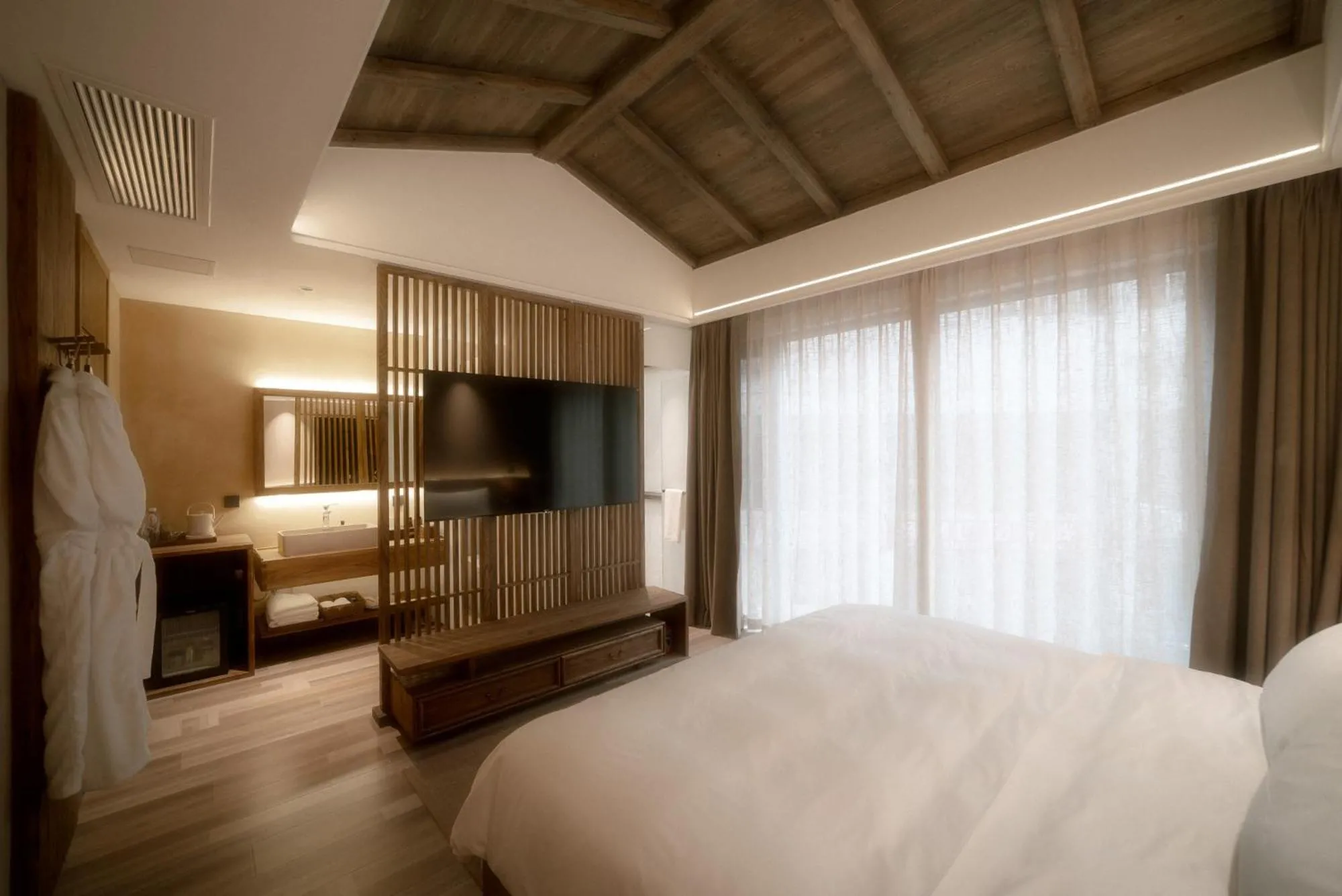 Bed in Shishe Spring Designer Homestay